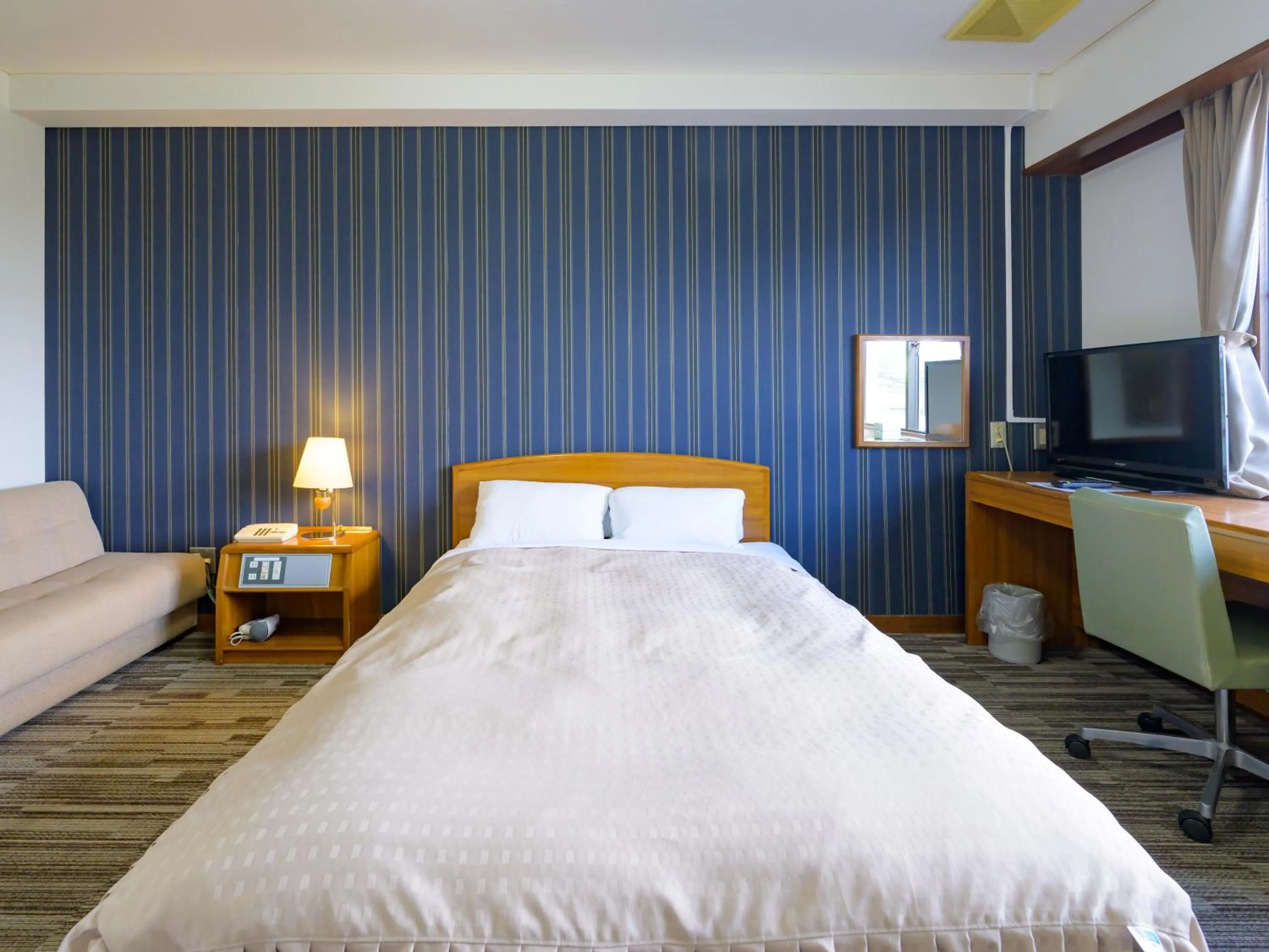 Photo of the whole room, Bed in Hisai Green Hotel