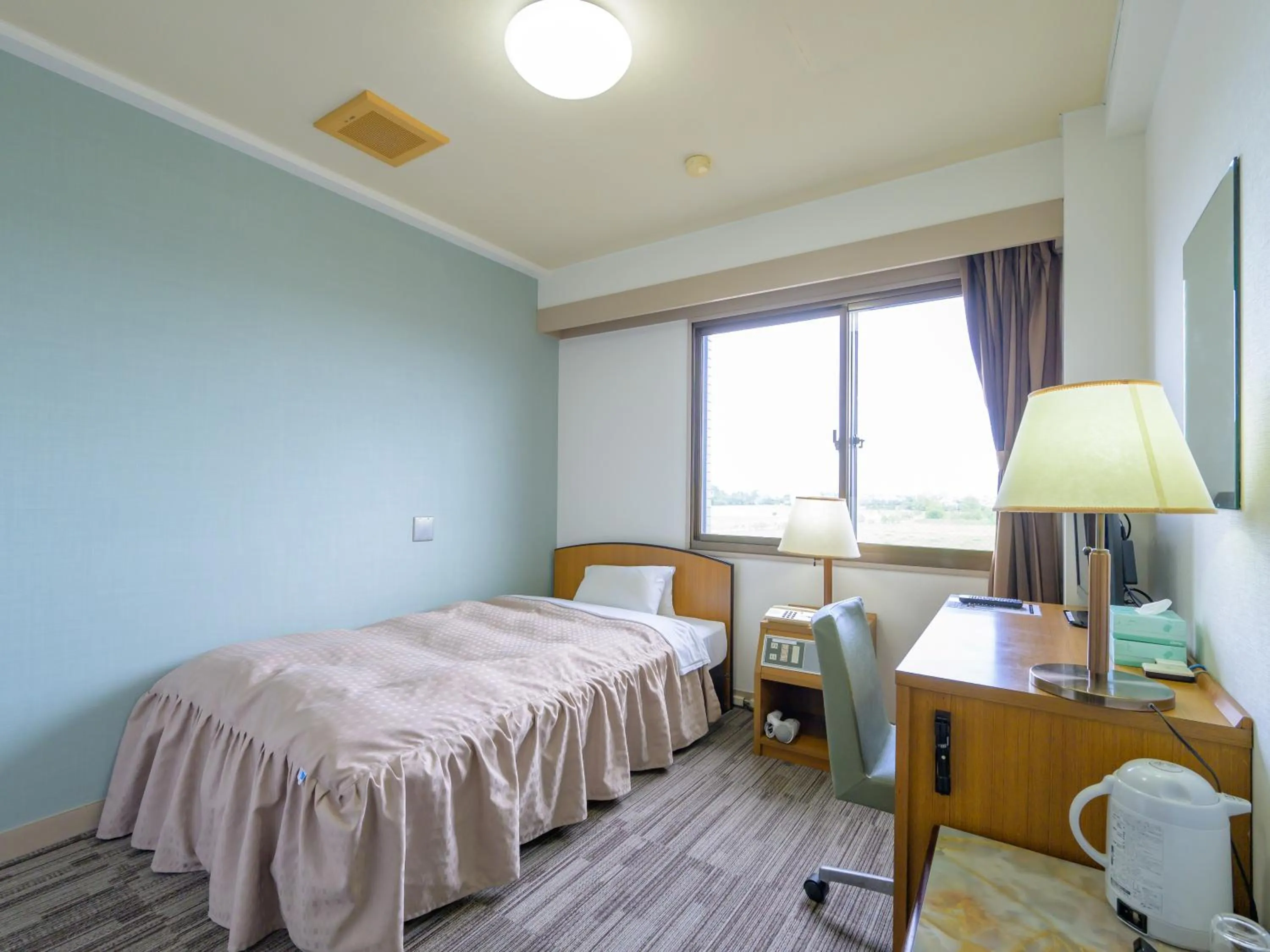 Photo of the whole room, Bed in Hisai Green Hotel