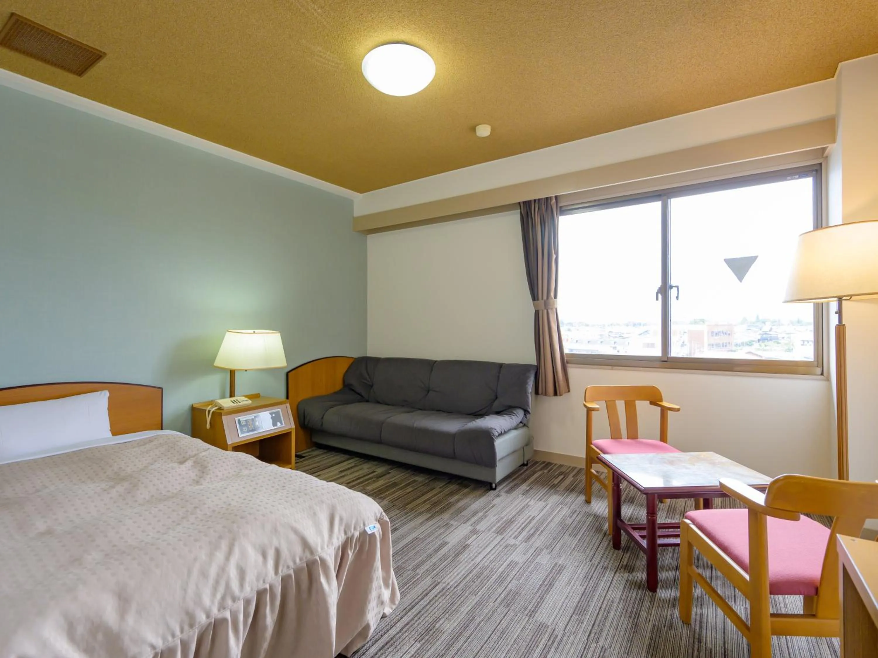 Photo of the whole room, Bed in Hisai Green Hotel