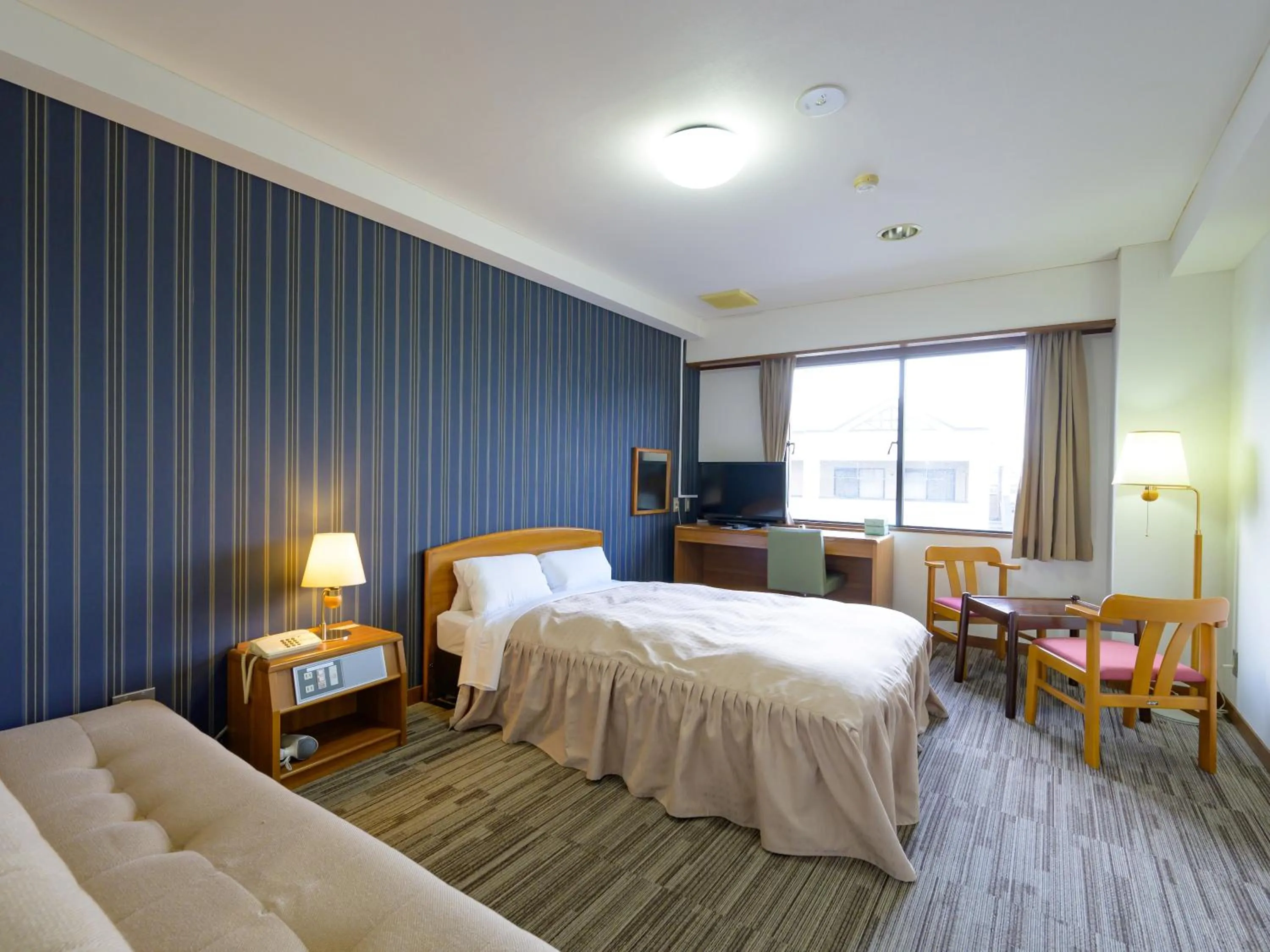 Photo of the whole room, Bed in Hisai Green Hotel