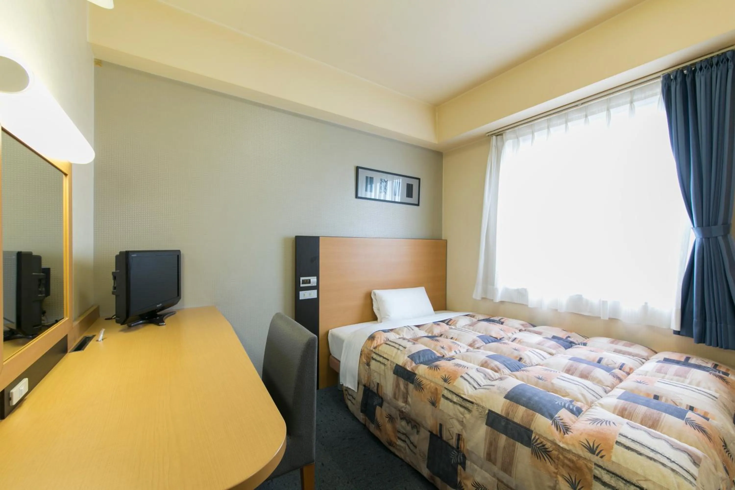 Photo of the whole room in Hotel Econo Taki