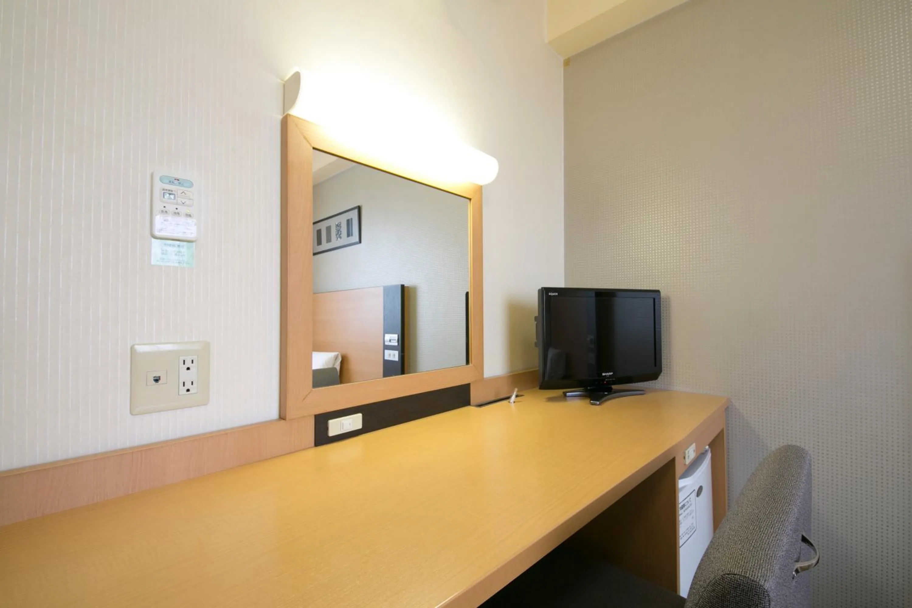 TV and multimedia in Hotel Econo Taki