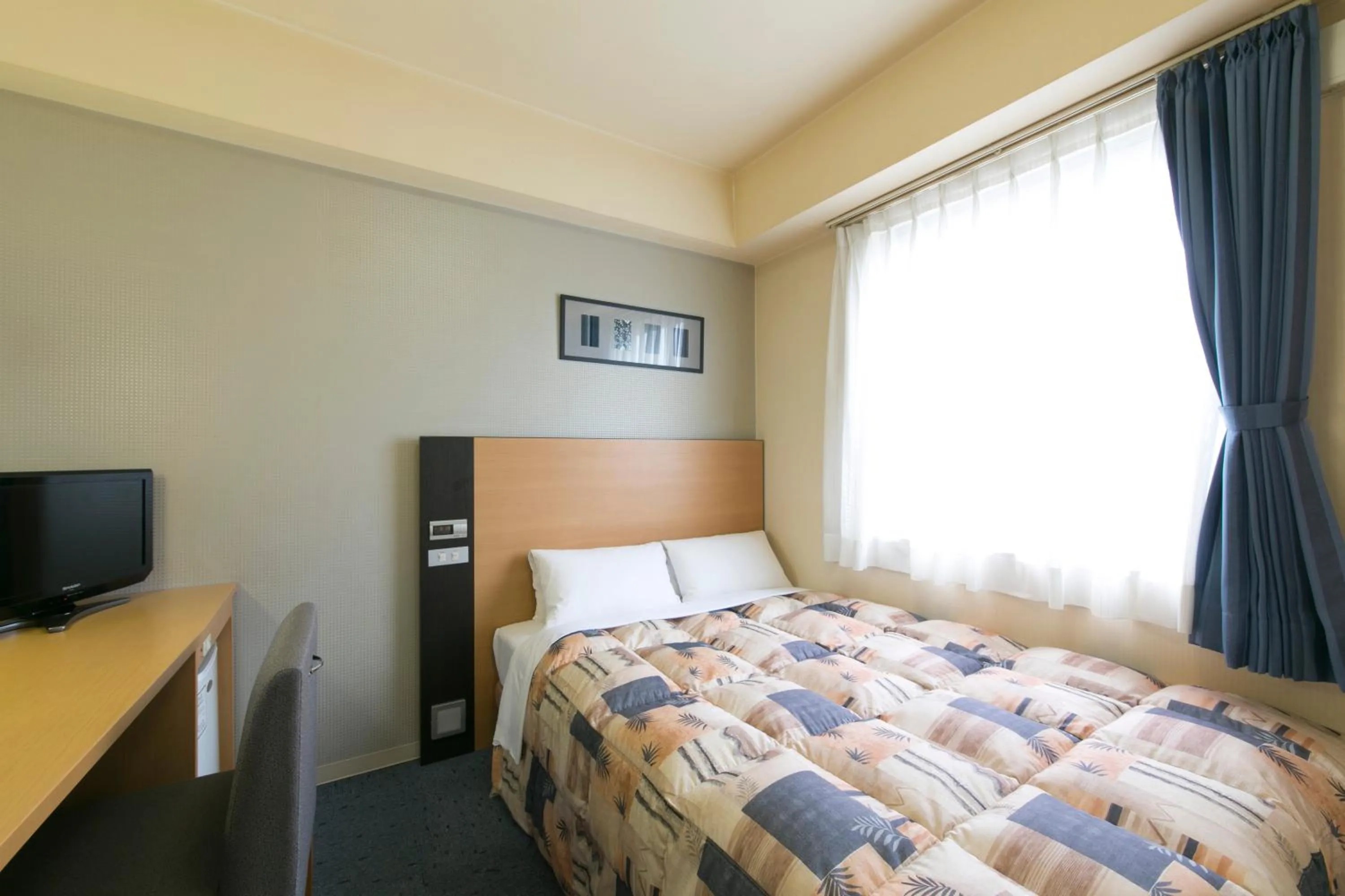 Photo of the whole room in Hotel Econo Taki