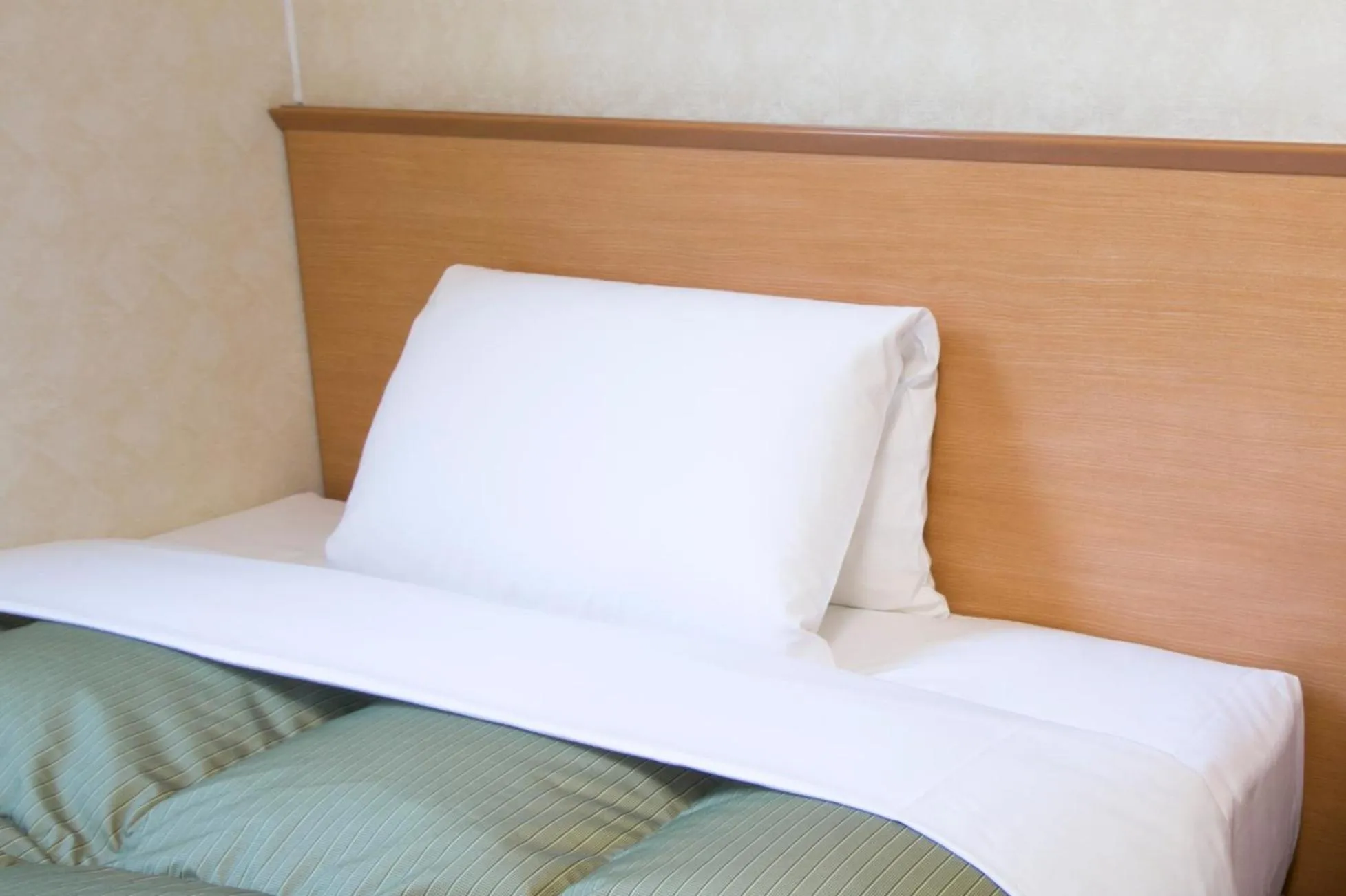 Bed in Best Inn Uozu