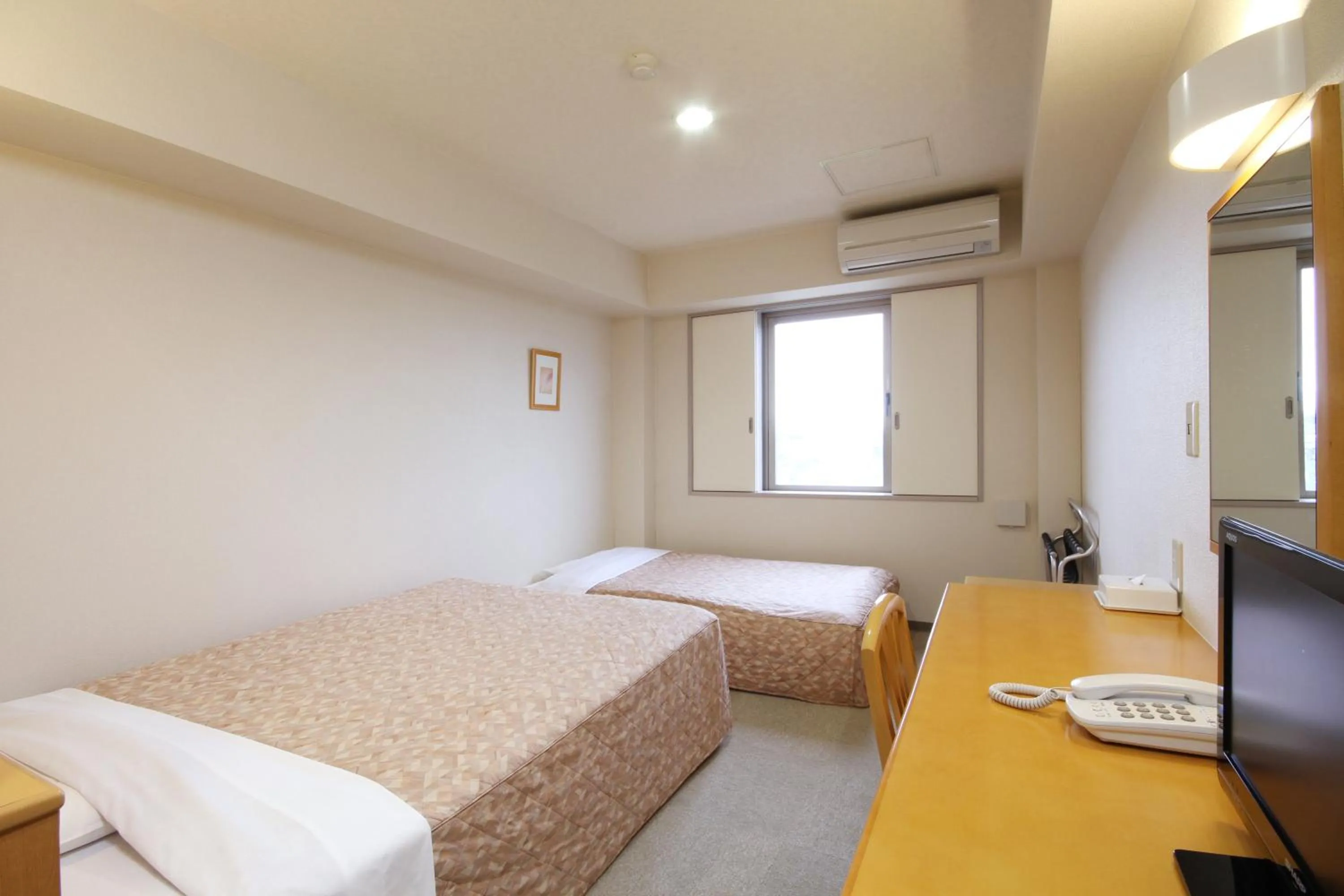 Photo of the whole room, Bed in Best Inn Uozu