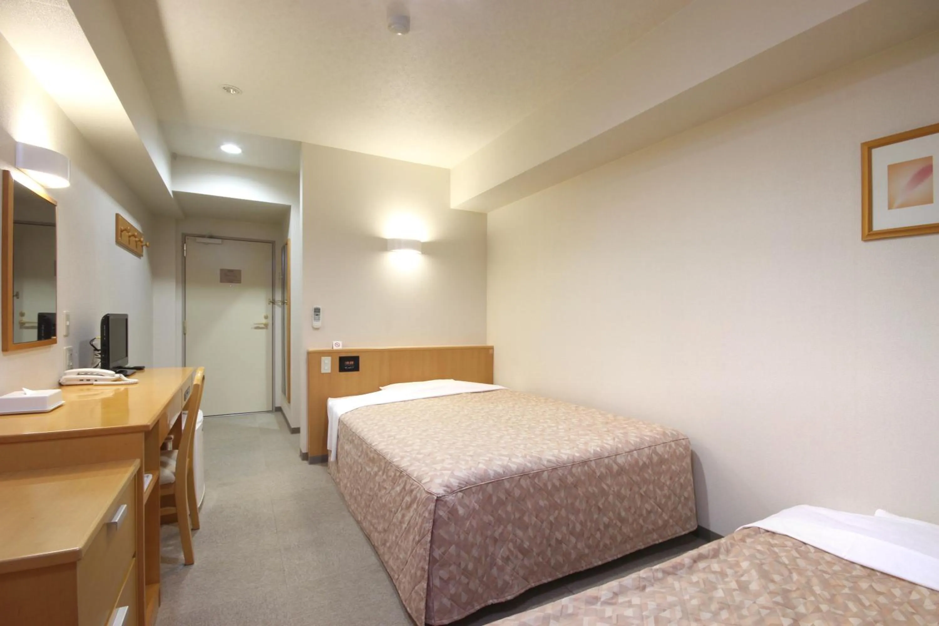 Photo of the whole room, Bed in Best Inn Uozu