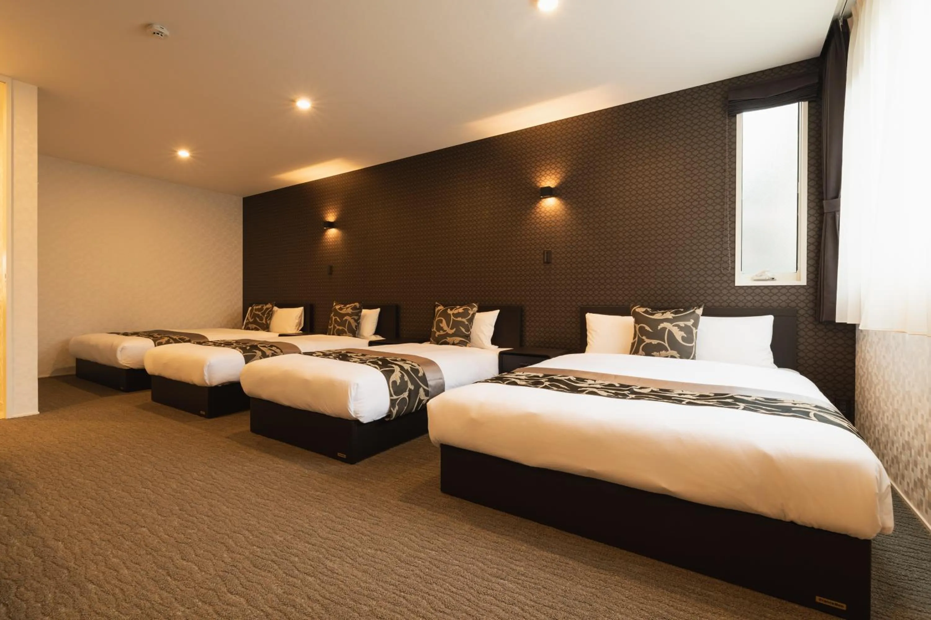 Bedroom, Bed in GRAND BASE Nagasaki Ekimae