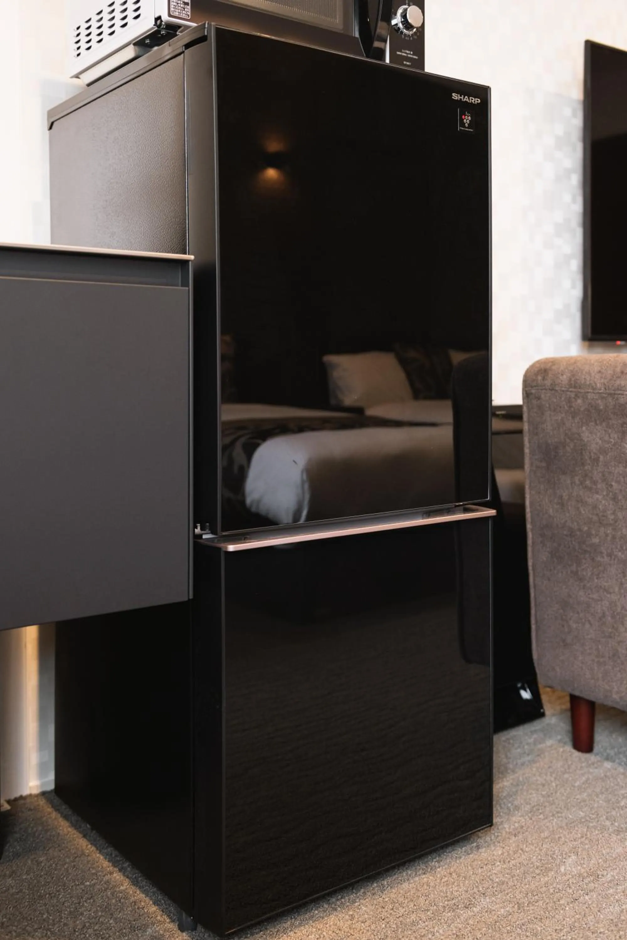 Photo of the whole room, Bed in GRAND BASE Nagasaki Ekimae