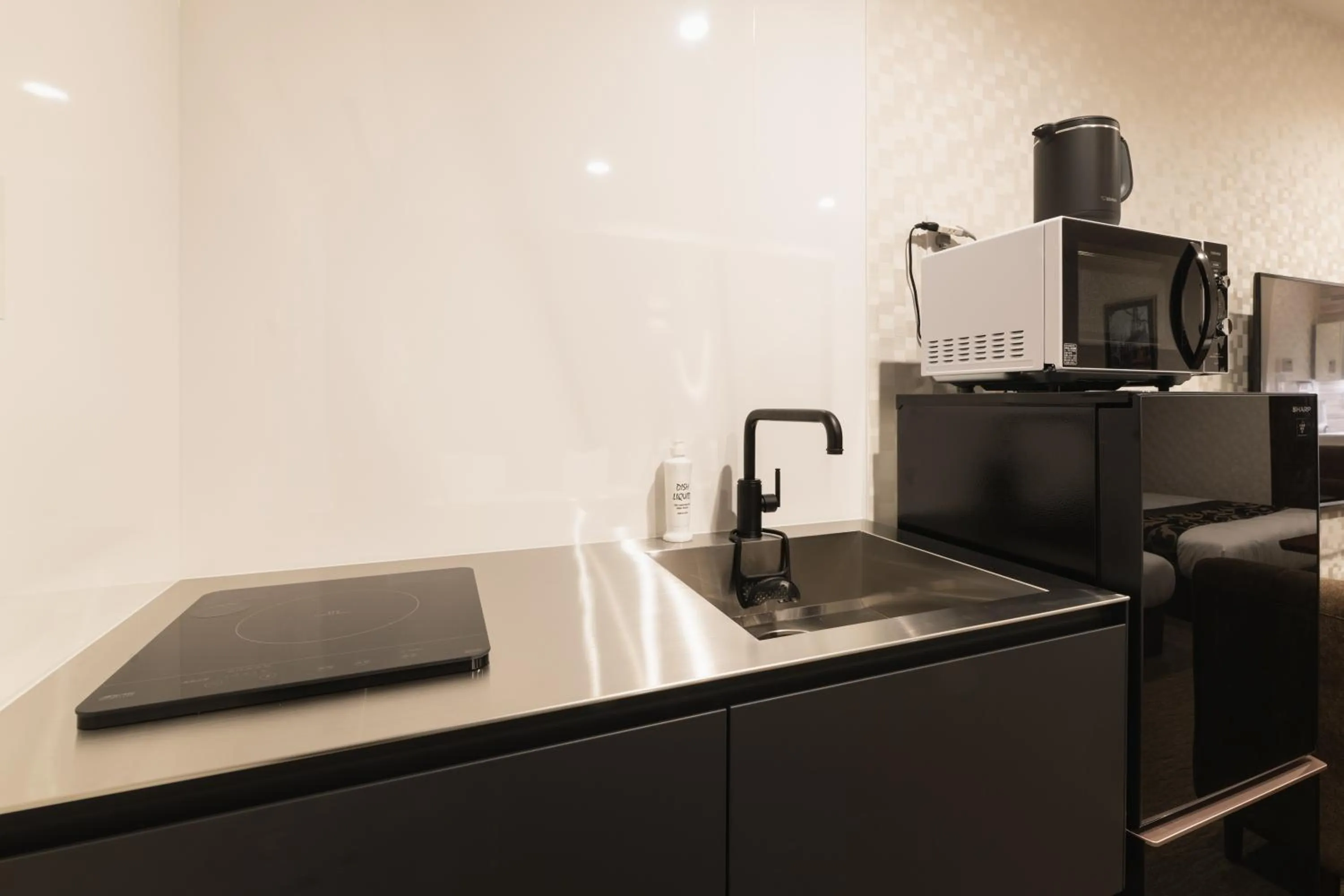 Kitchen or kitchenette in GRAND BASE Nagasaki Ekimae