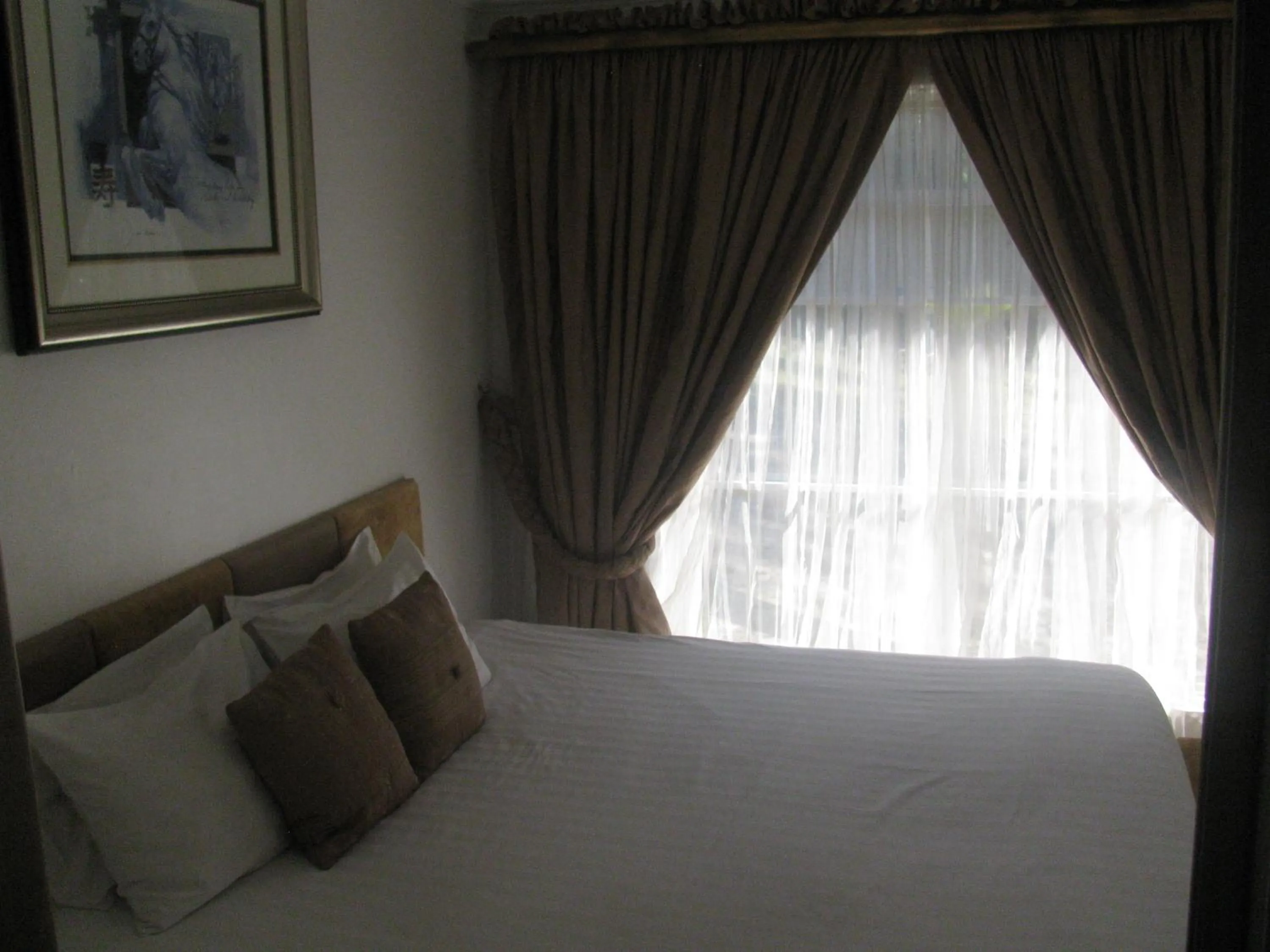 Bed in Bruno Comfort Suites