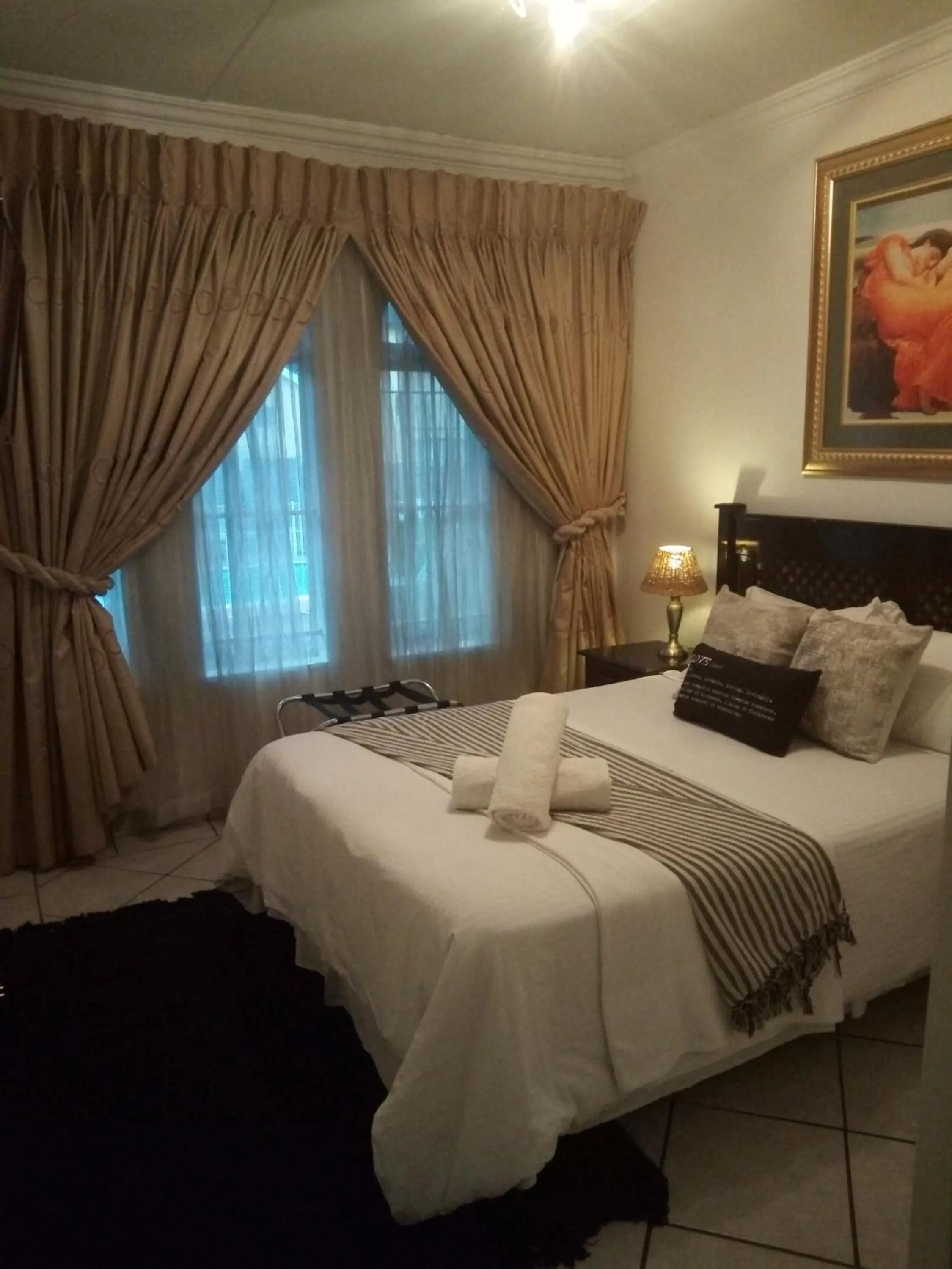 Bed in Bruno Comfort Suites