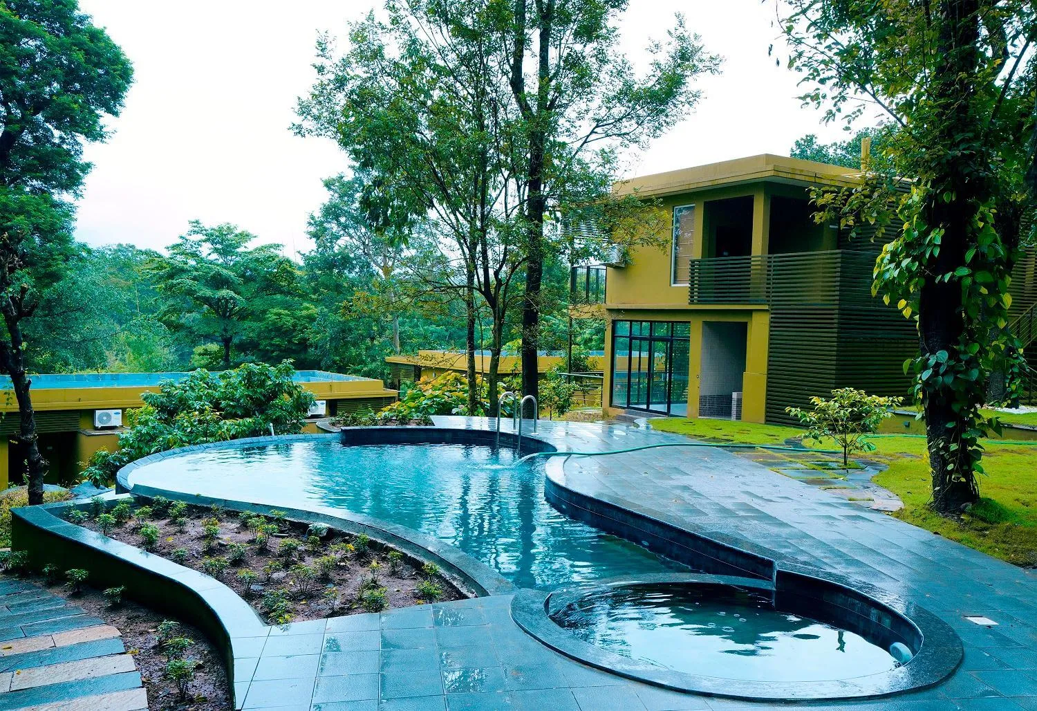Swimming pool in Kuruva Island Resort And Spa - By KABINI BREEZE