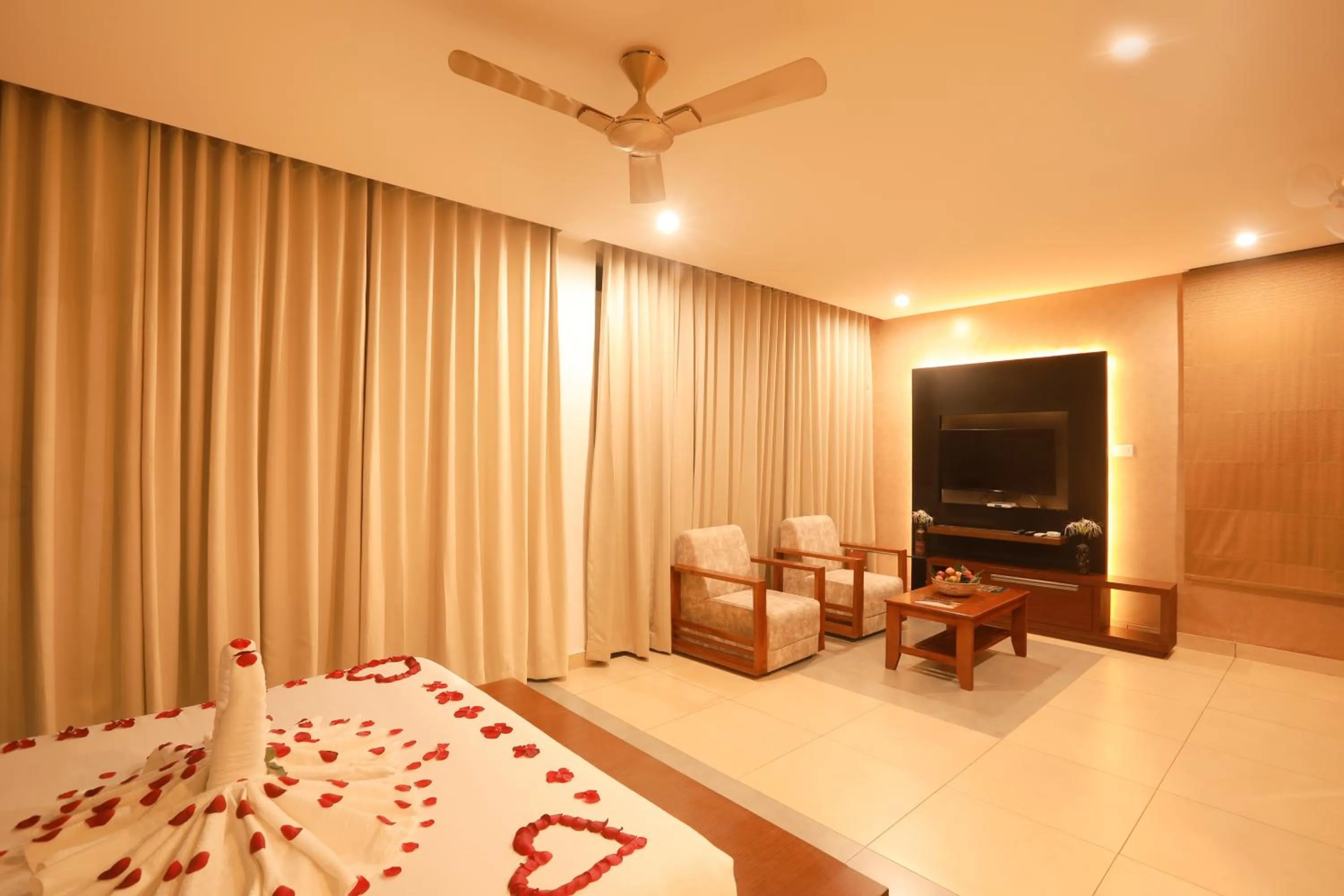 Living room, Bed in Kuruva Island Resort And Spa - By KABINI BREEZE