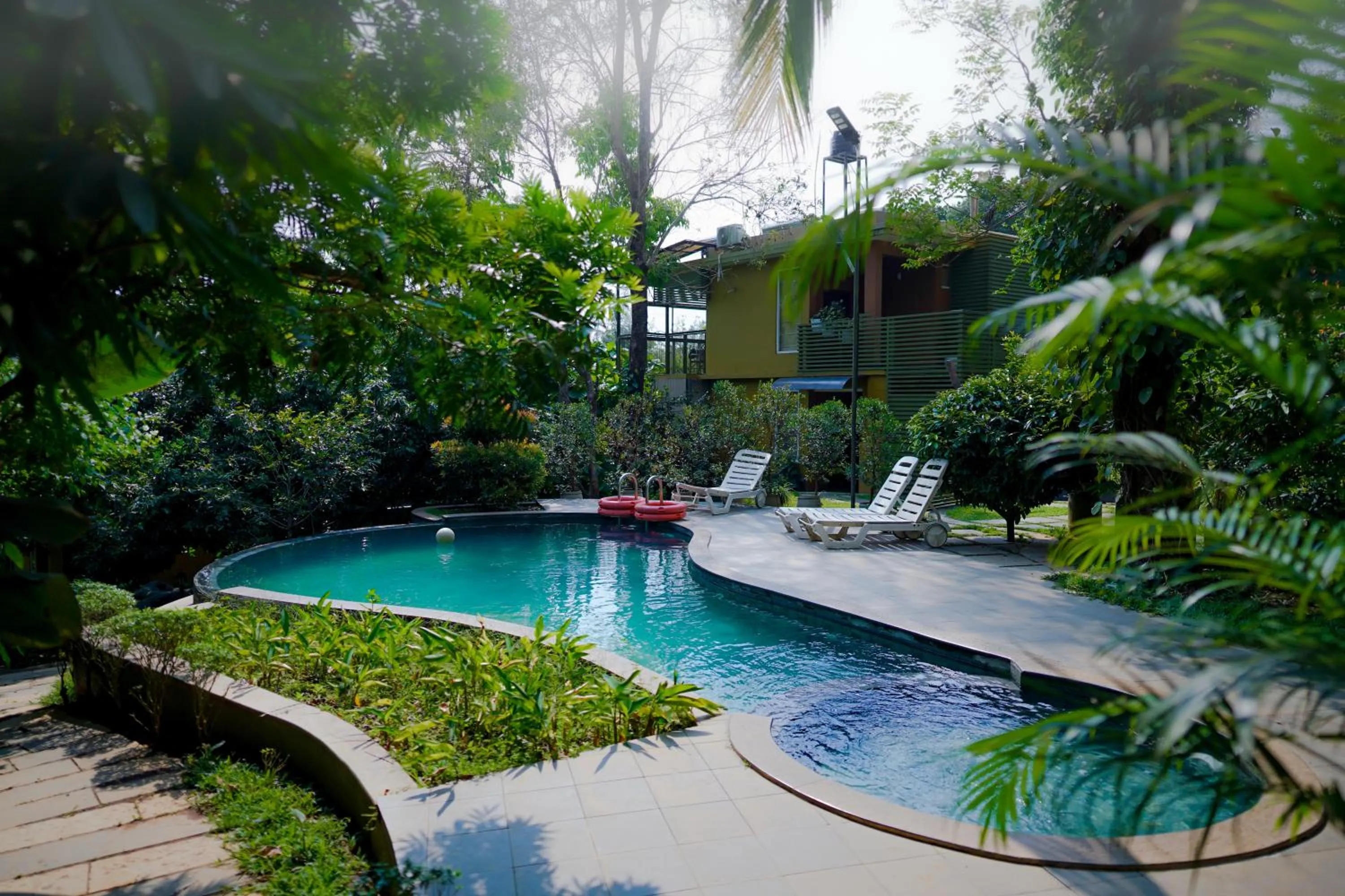 Swimming pool in Kuruva Island Resort And Spa - By KABINI BREEZE