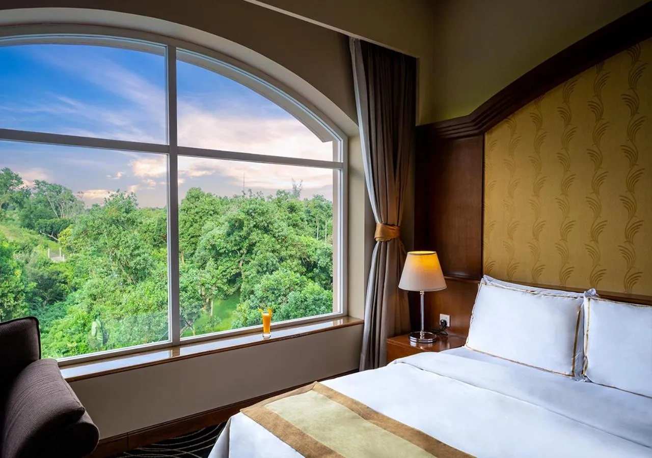 Bed in Grand Sultan Tea Resort & Golf