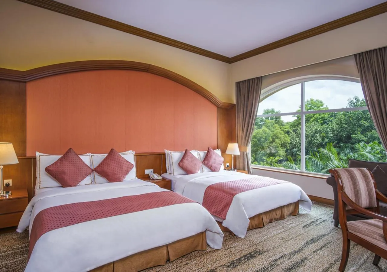 Bed in Grand Sultan Tea Resort & Golf