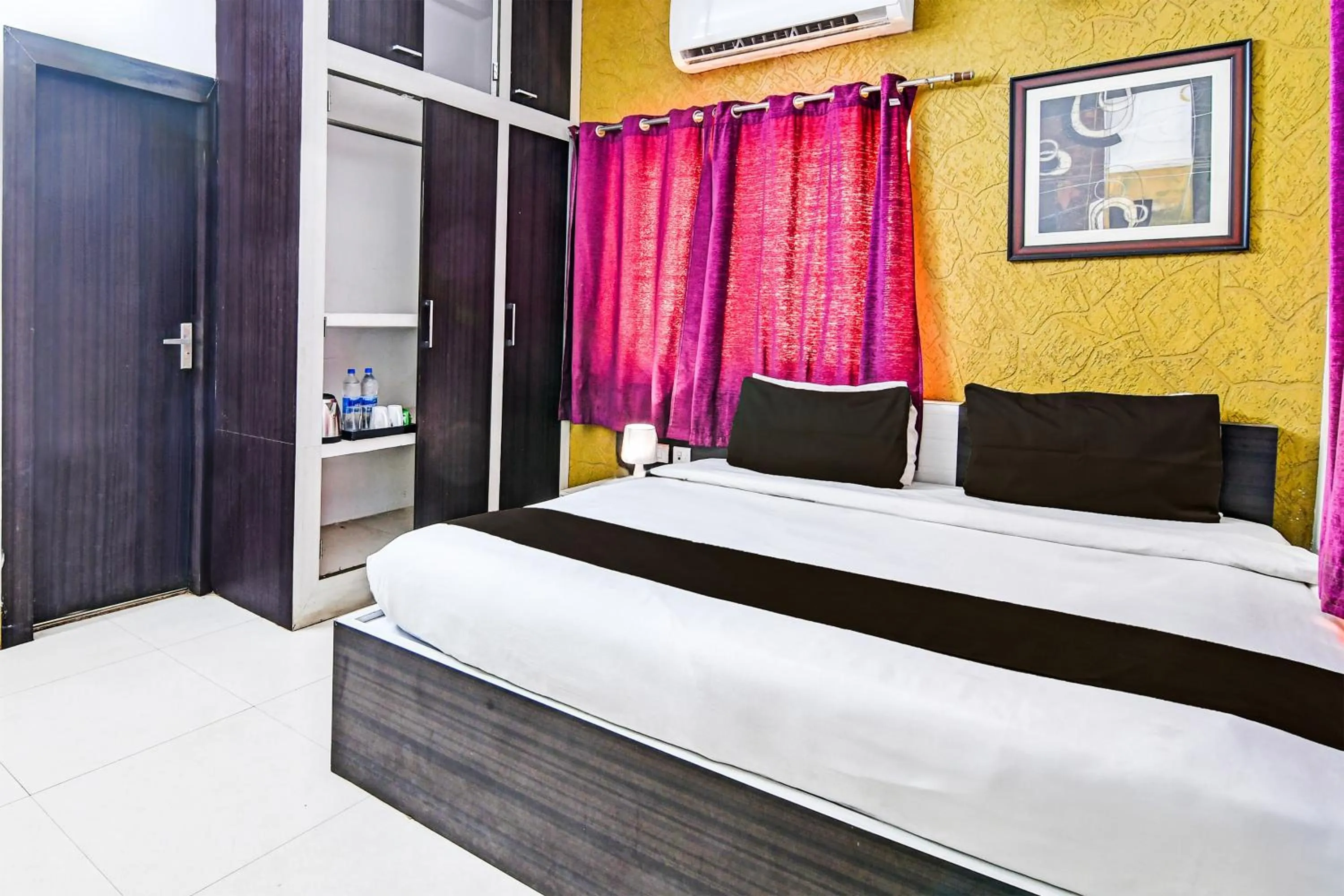 Bedroom in Hotel O Home Bm-x