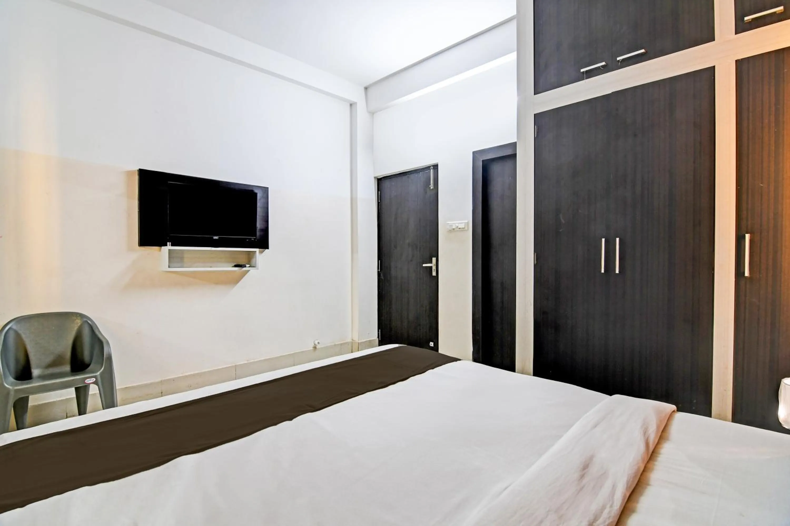 Bedroom in Hotel O Home Bm-x