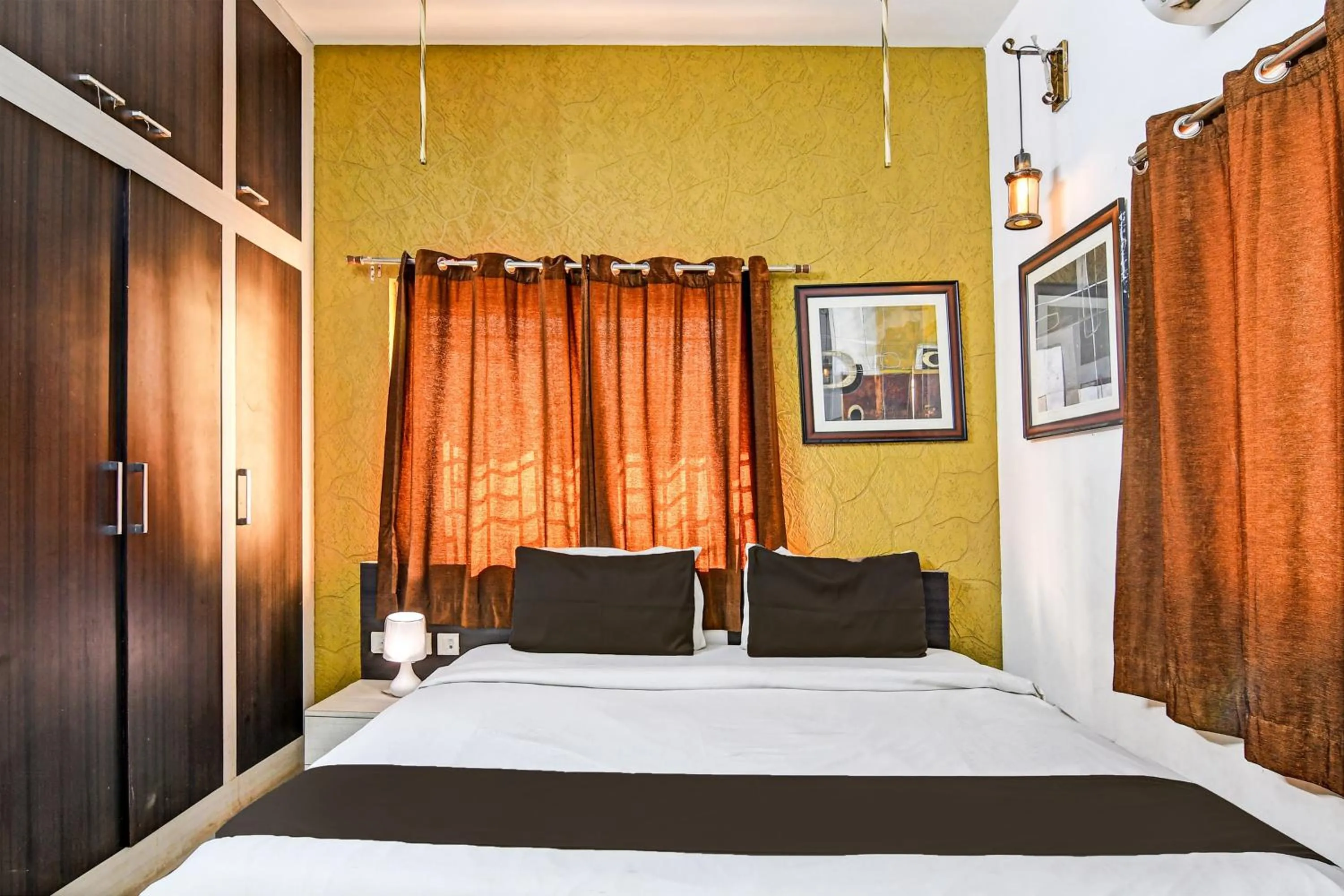 Bedroom in Hotel O Home Bm-x