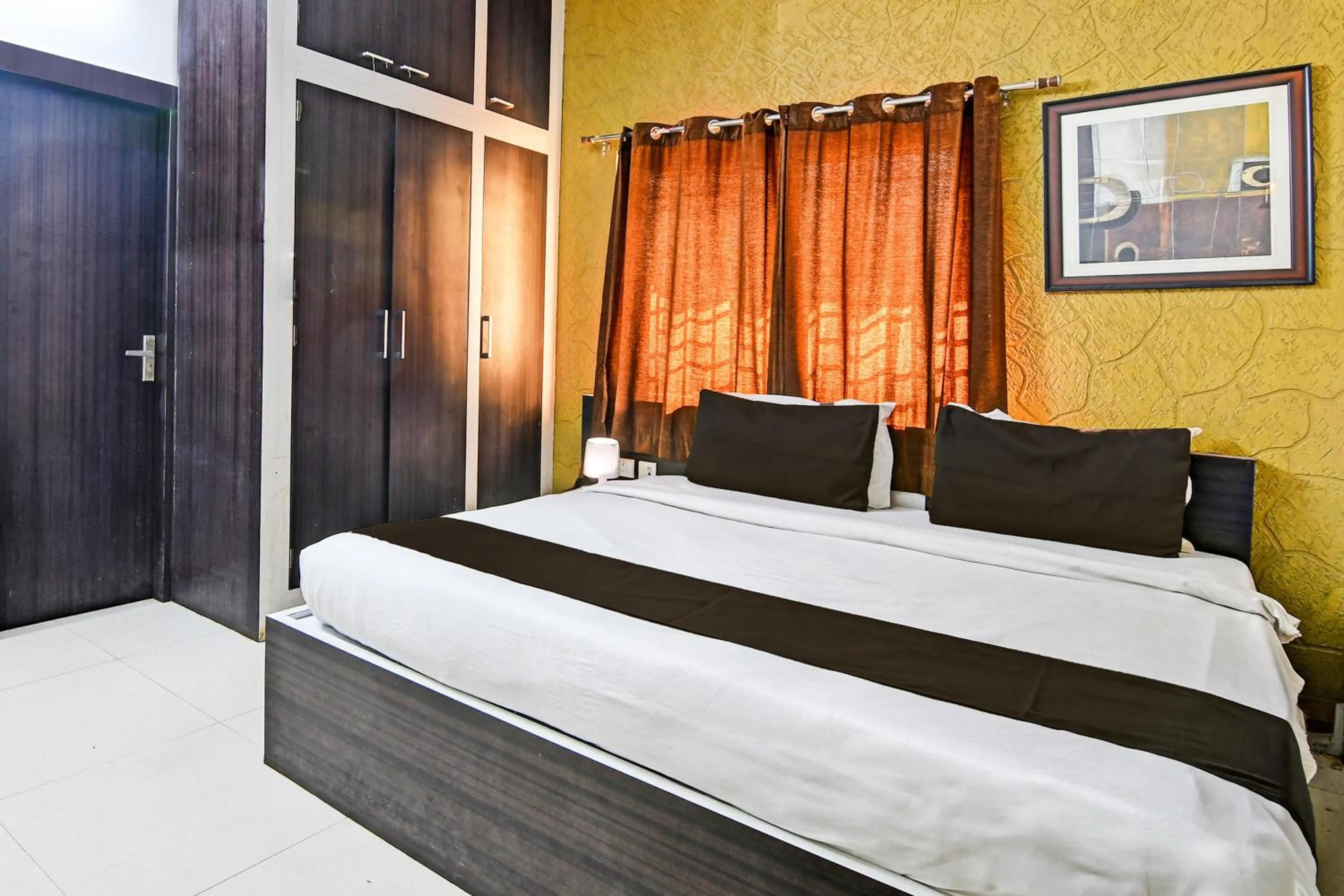 Bedroom in Hotel O Home Bm-x