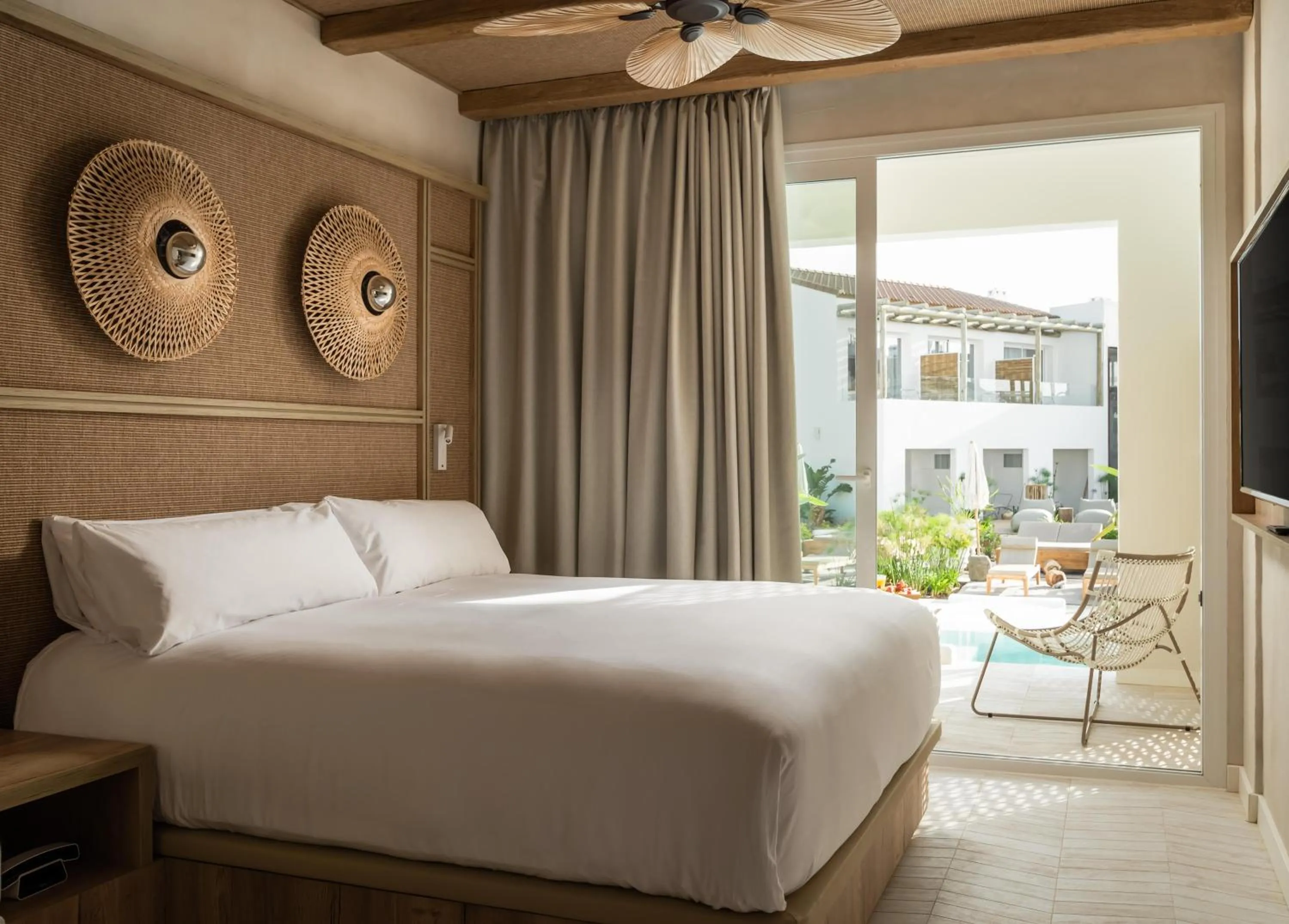 Photo of the whole room, Bed in Lago Resort Menorca - Suites del Lago Adults Only