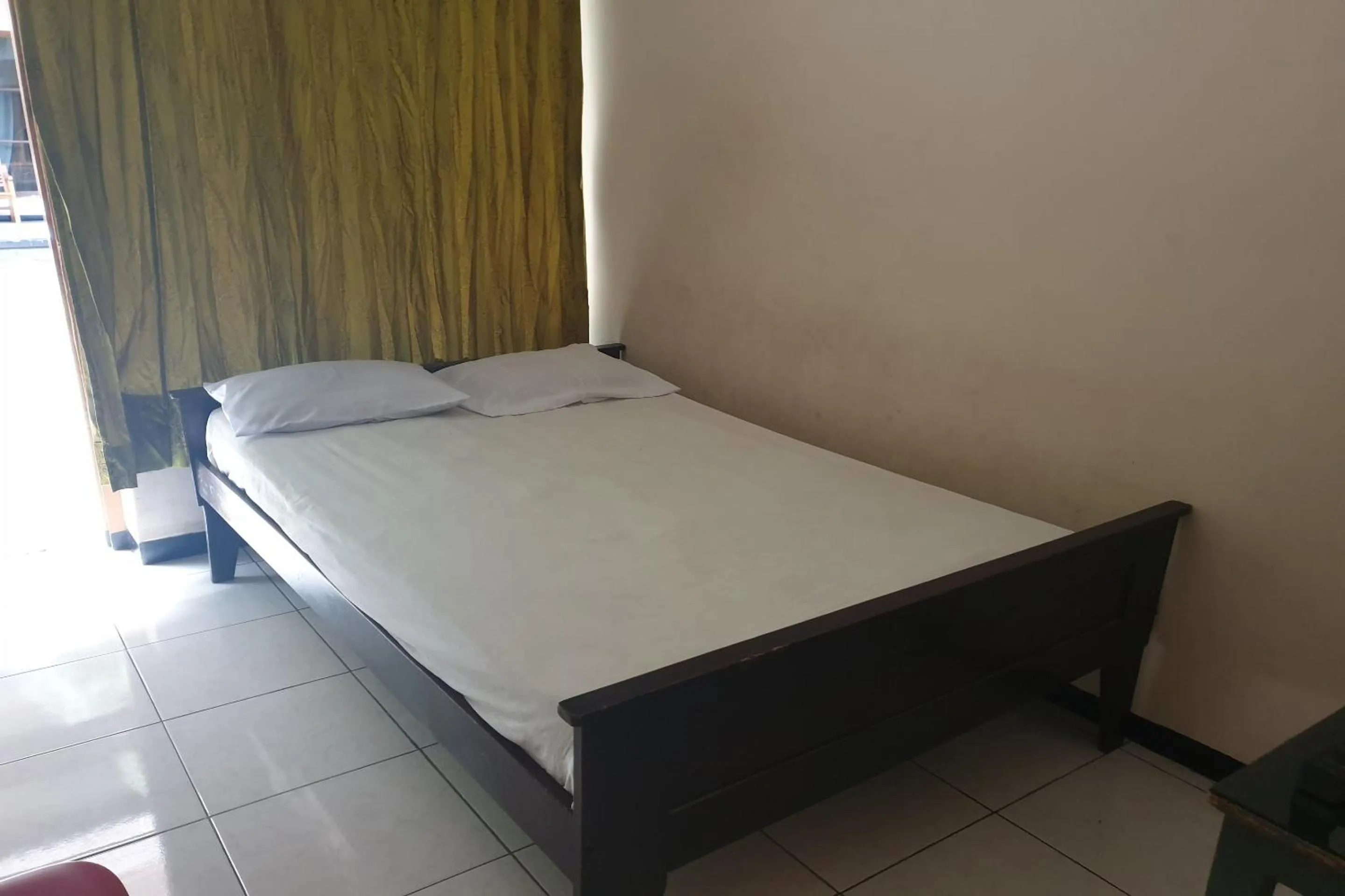 Bedroom, Bed in OYO Life 2090 Ratna Backpacker Syariah