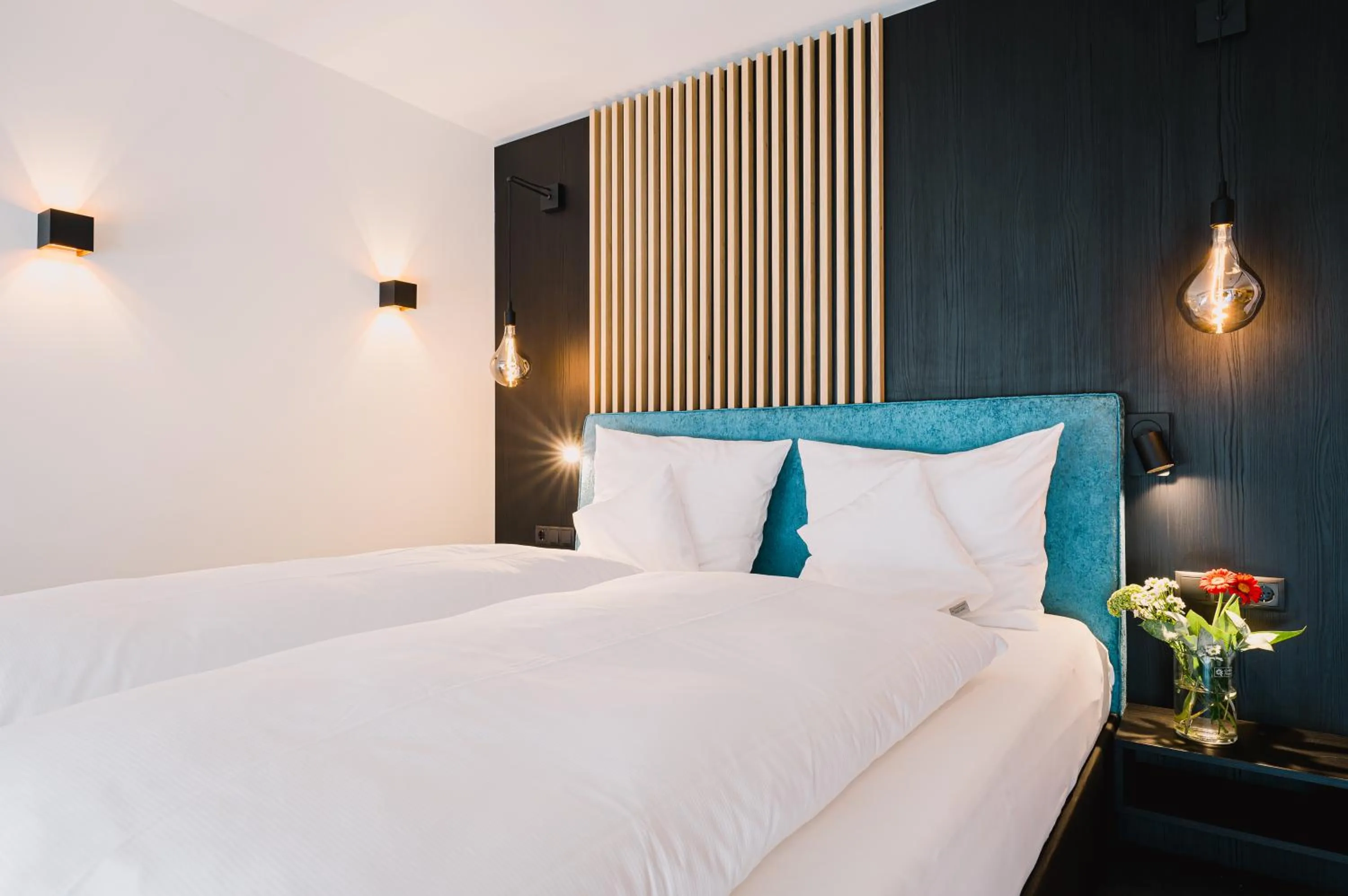 Bed in Aqua Blu Hotel