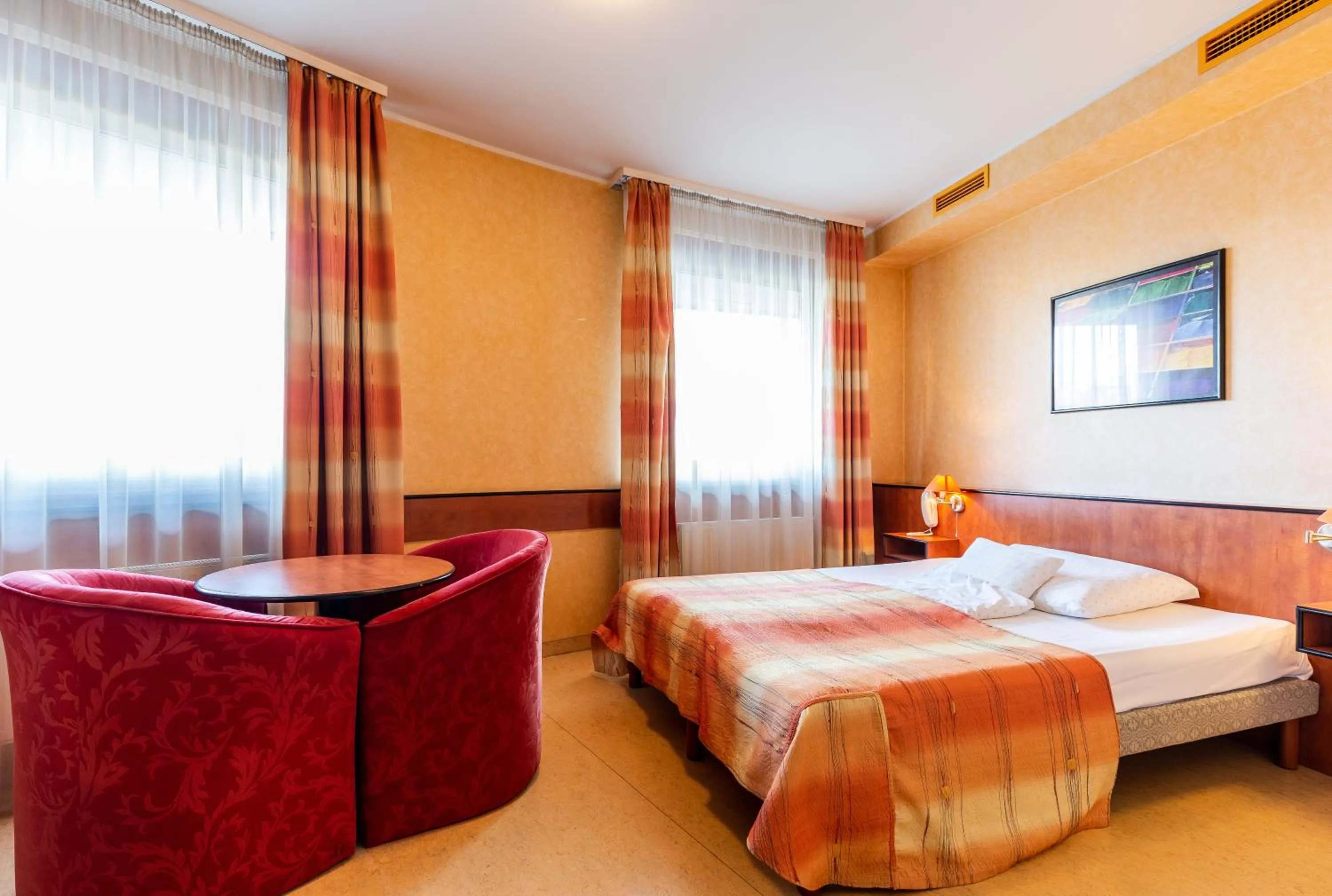 Bed in Corner Motel