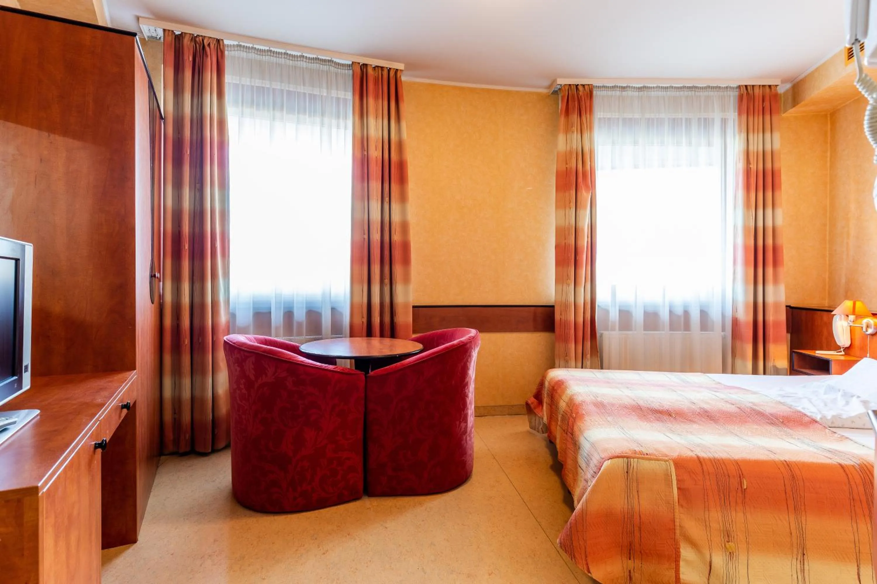 Bed in Corner Motel