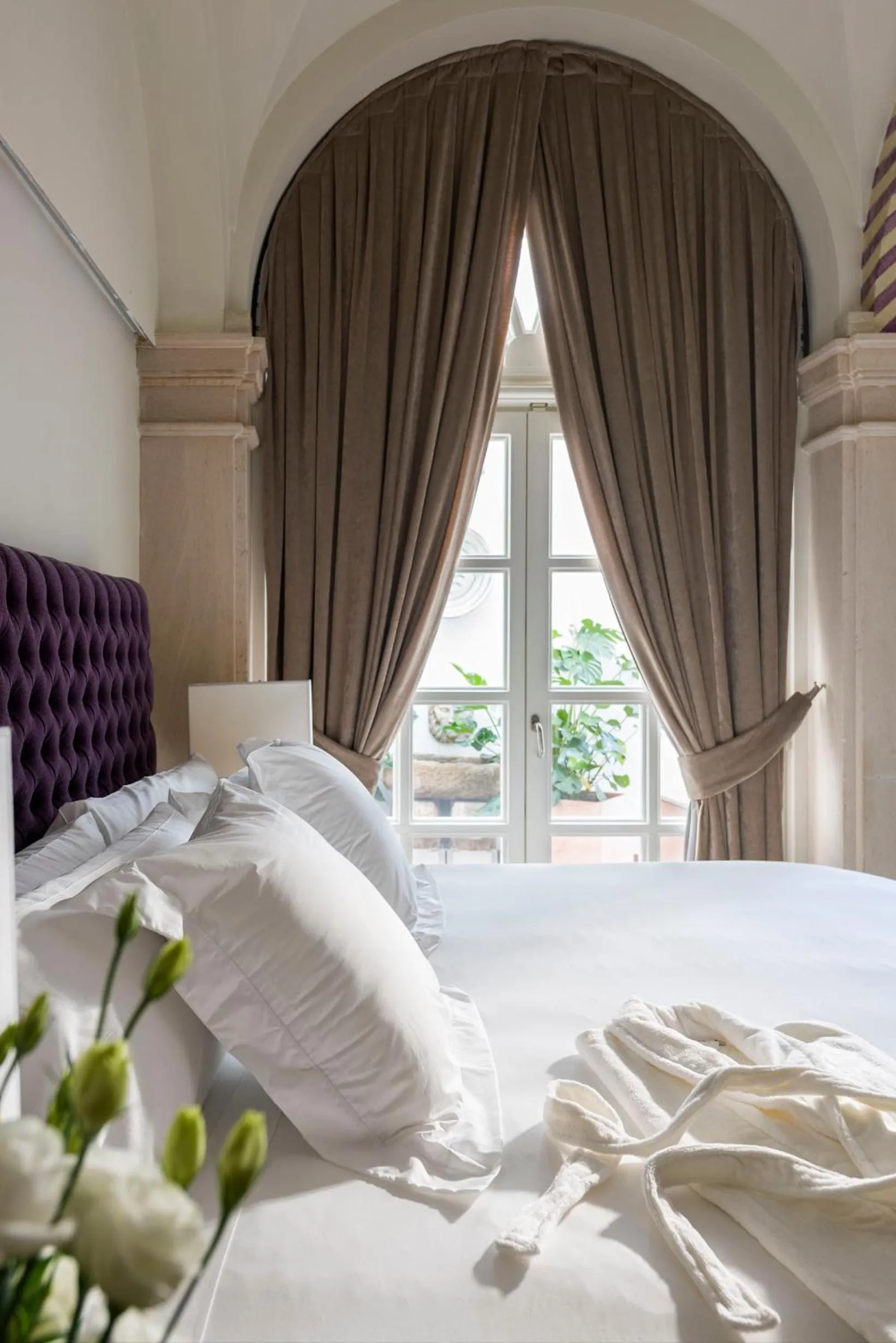 Bed in Casa de Triana Luxury Suites by Casa del Poeta