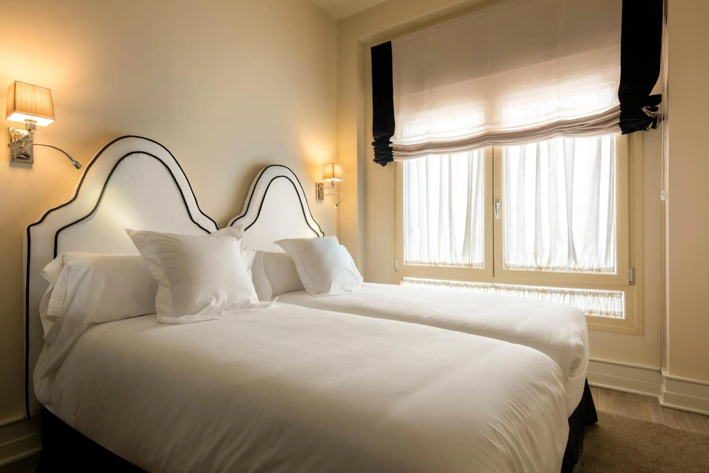 Bed in Casa de Triana Luxury Suites by Casa del Poeta