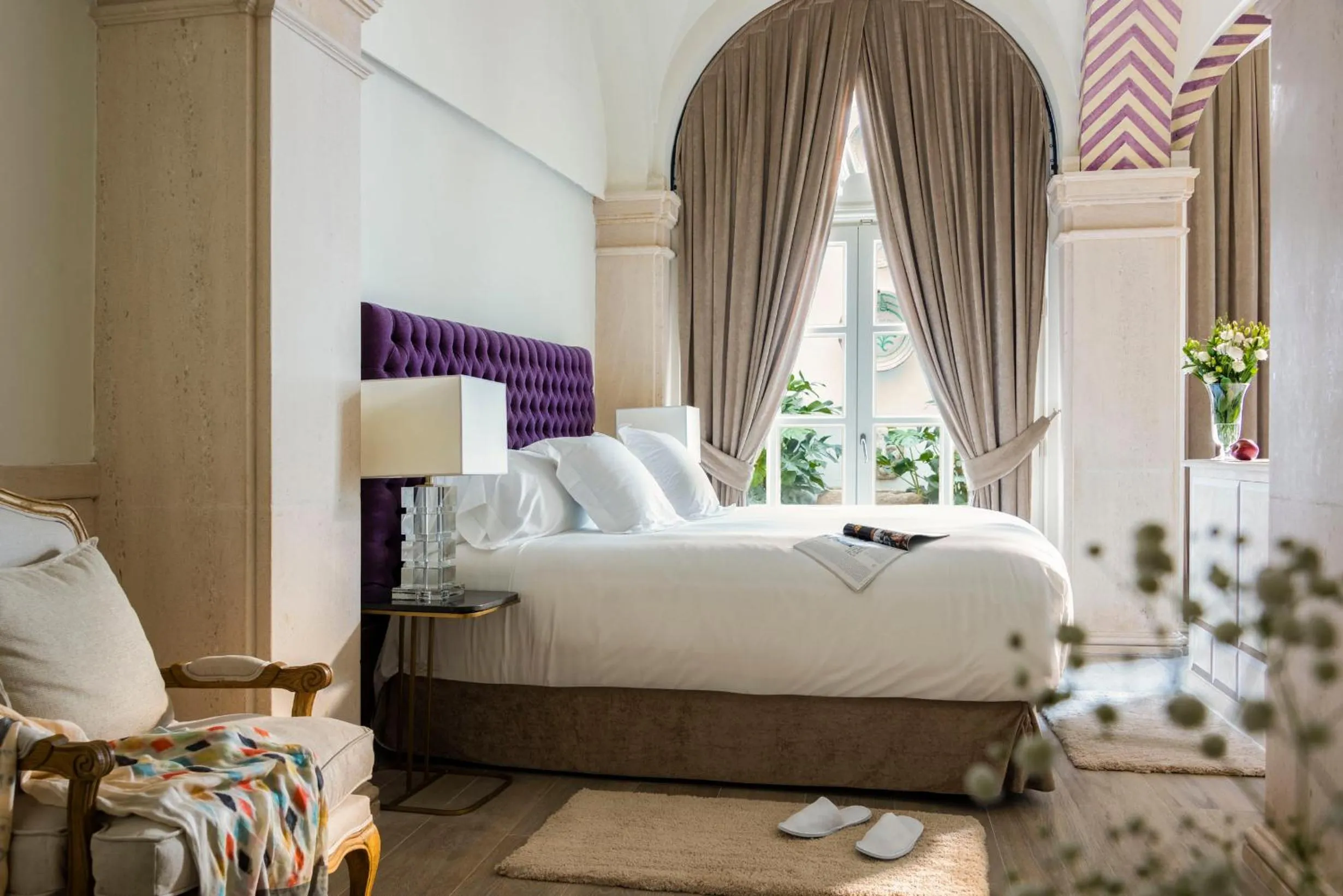 Bed in Casa de Triana Luxury Suites by Casa del Poeta