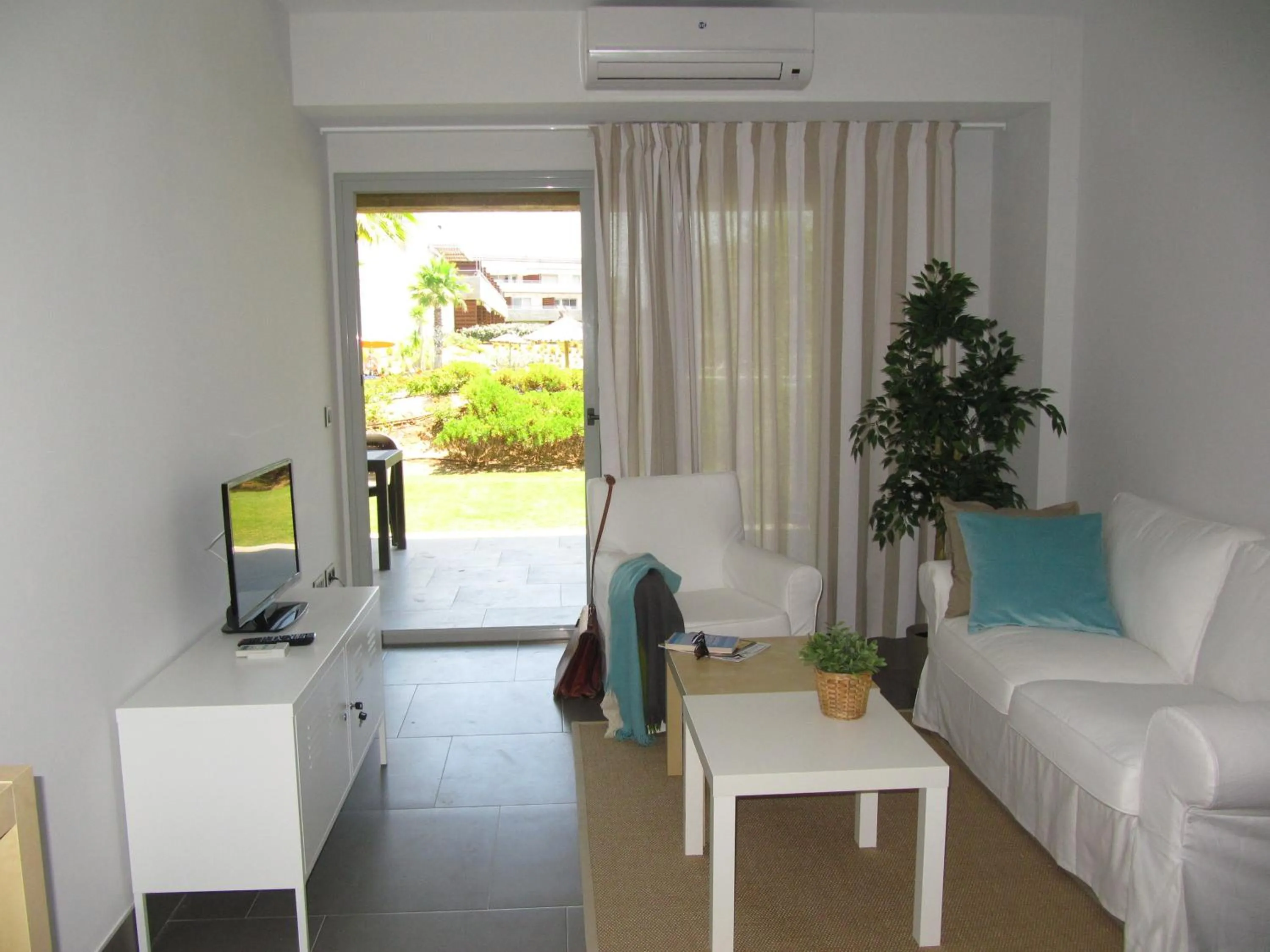 Seating area in Life Apartments El Rompido