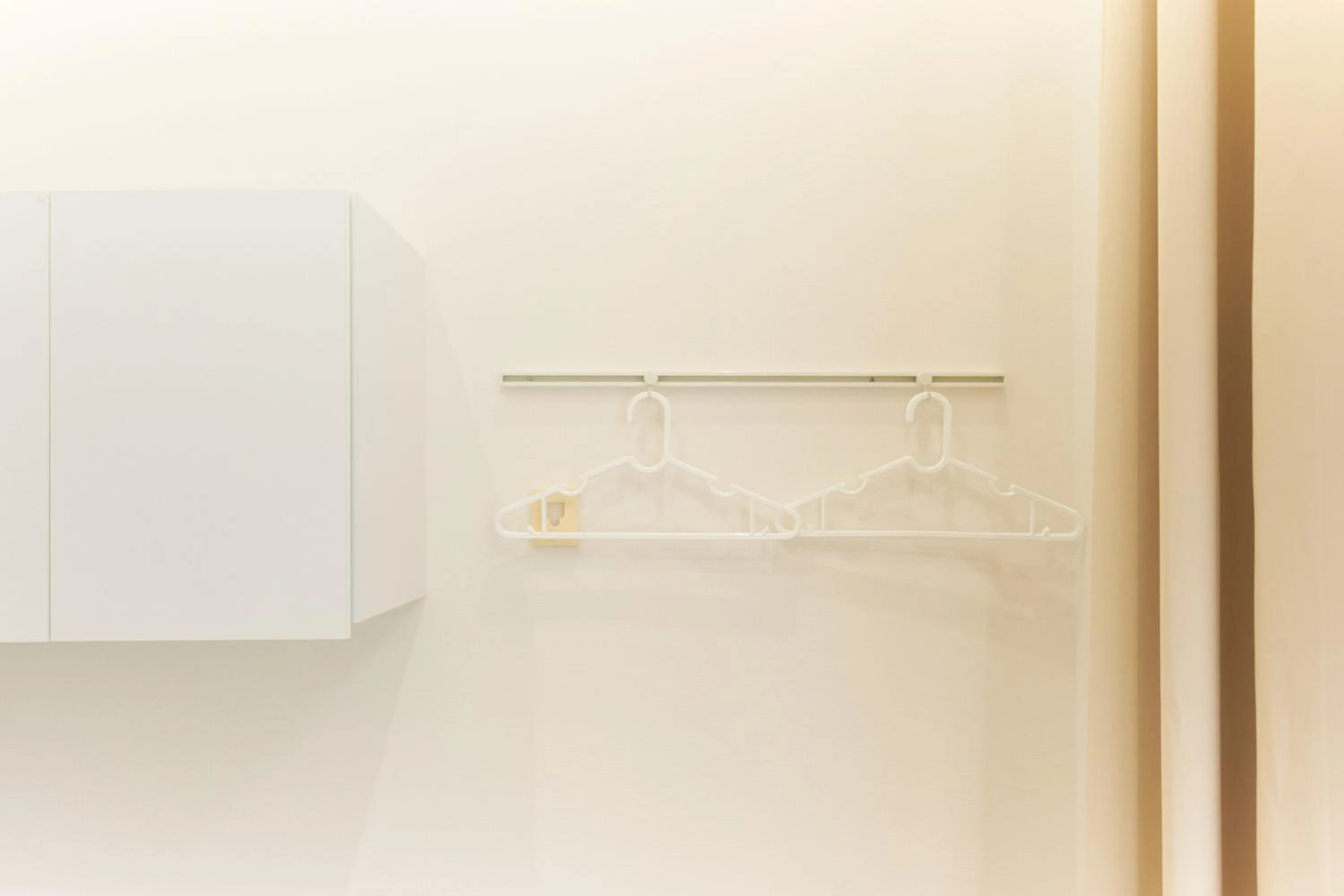 wardrobe in Nano North Shinjuku Apartment by Tranova