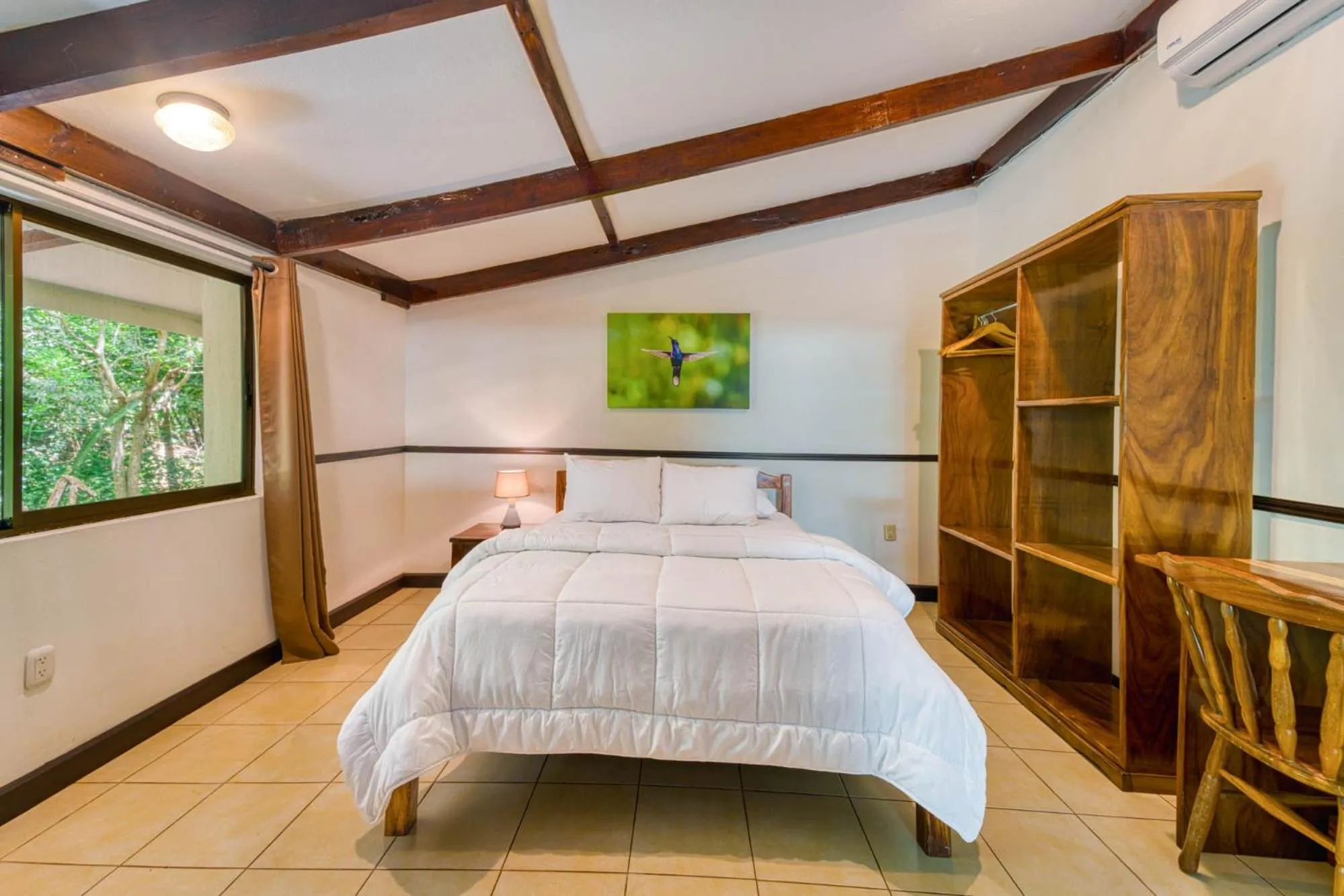 Bed in Hacienda La Pacífica Eco-Lodge