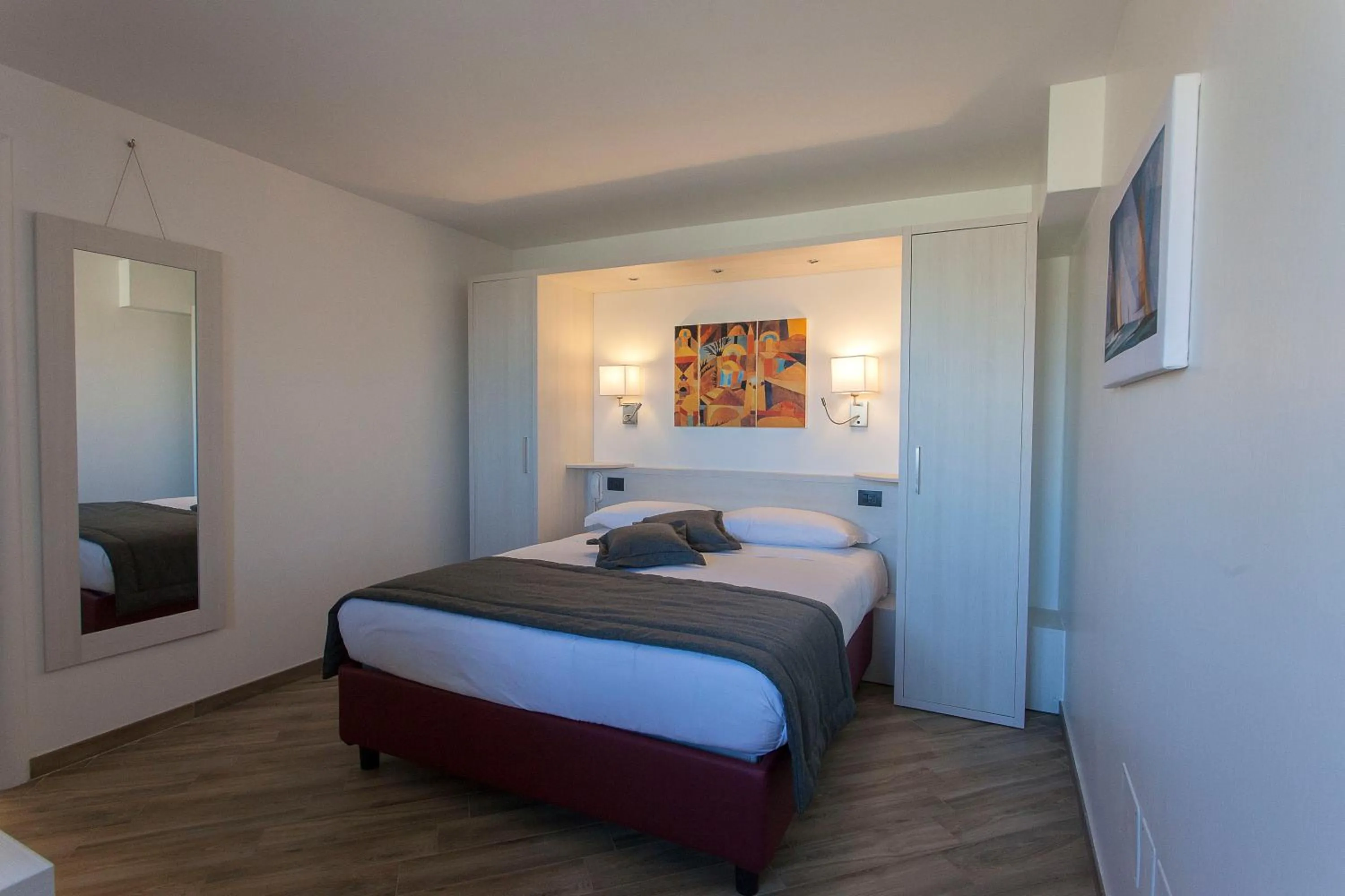 Bed in Astra Roma Apartments