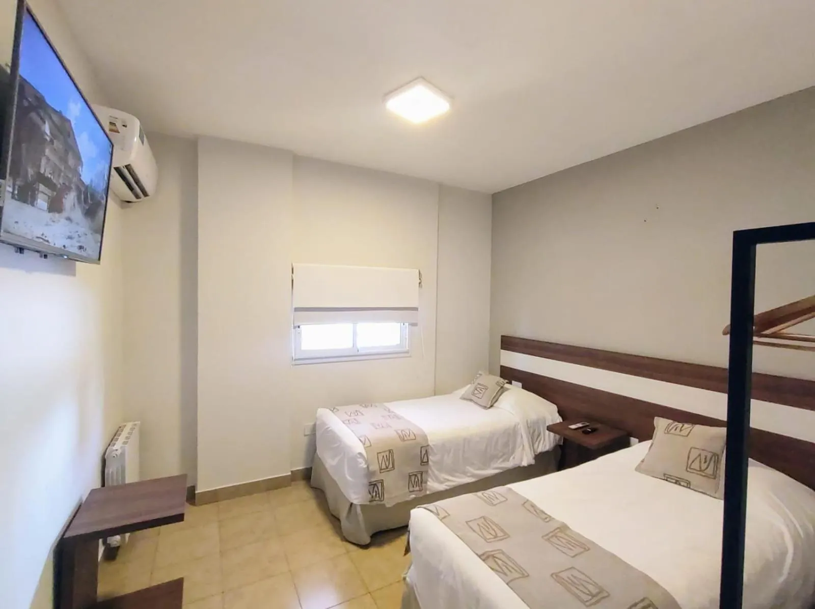 TV and multimedia, Bed in Urquiza Suites Salta