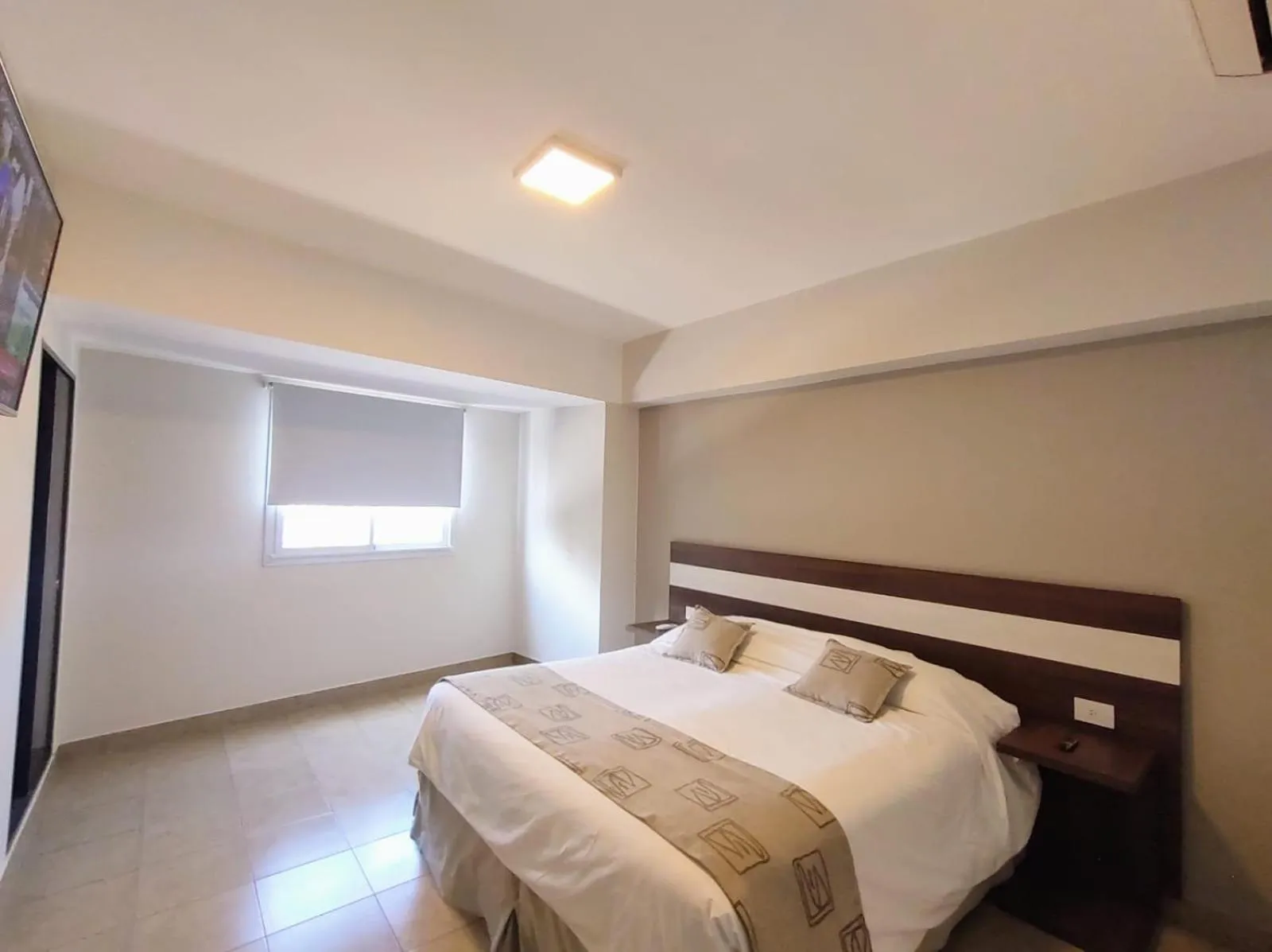 Bed in Urquiza Suites Salta