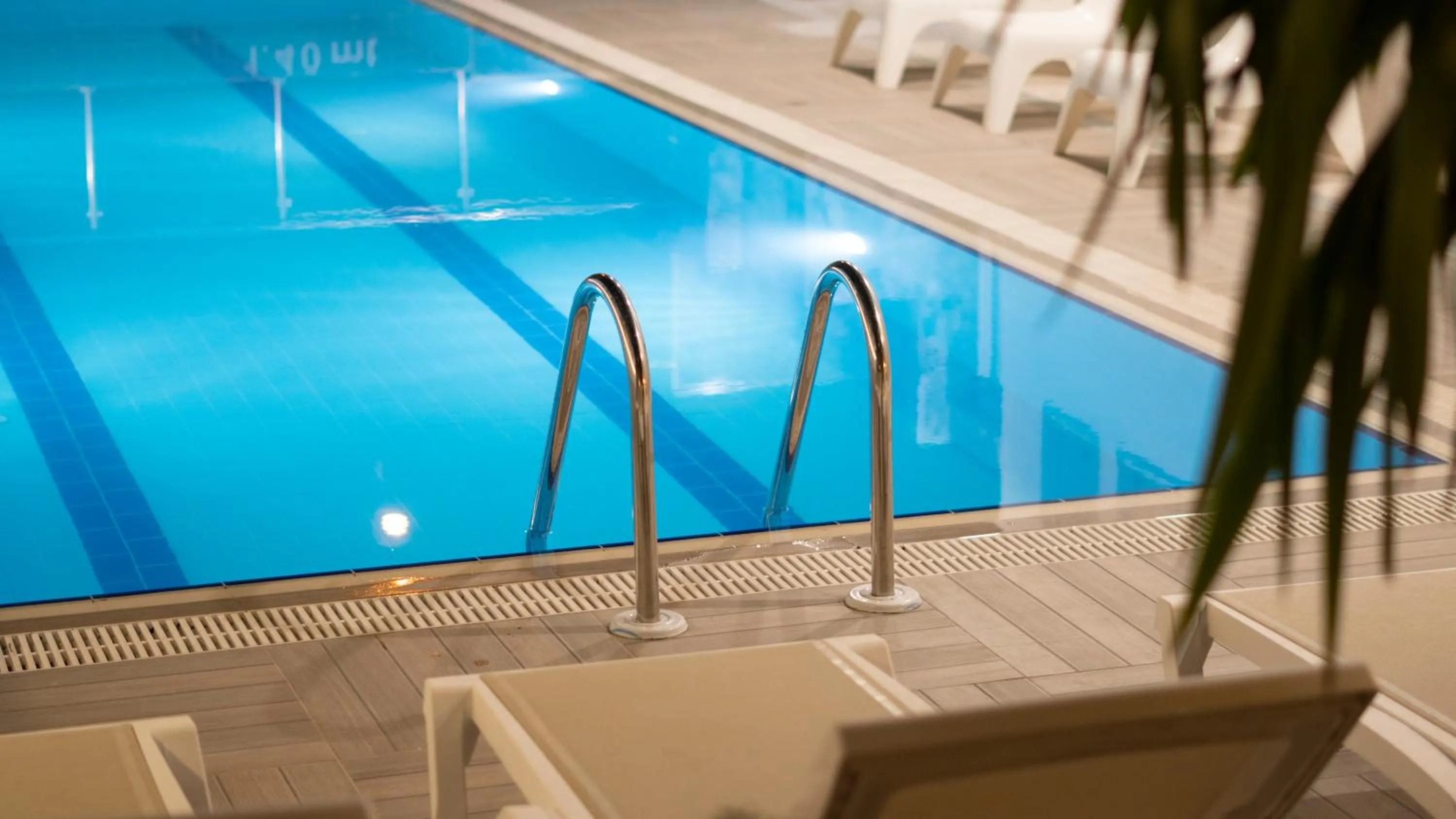 Pool view in OPERA SUITES Apart Hotel