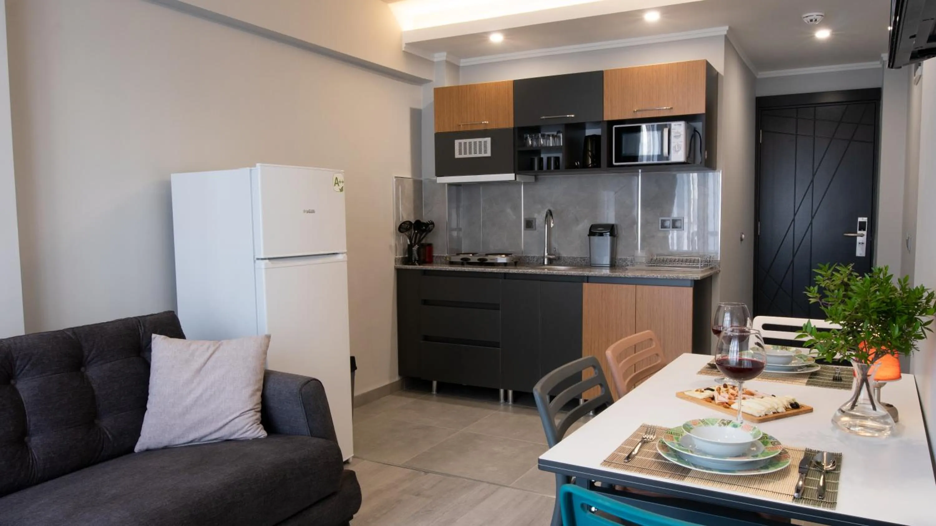 Kitchen or kitchenette in OPERA SUITES Apart Hotel