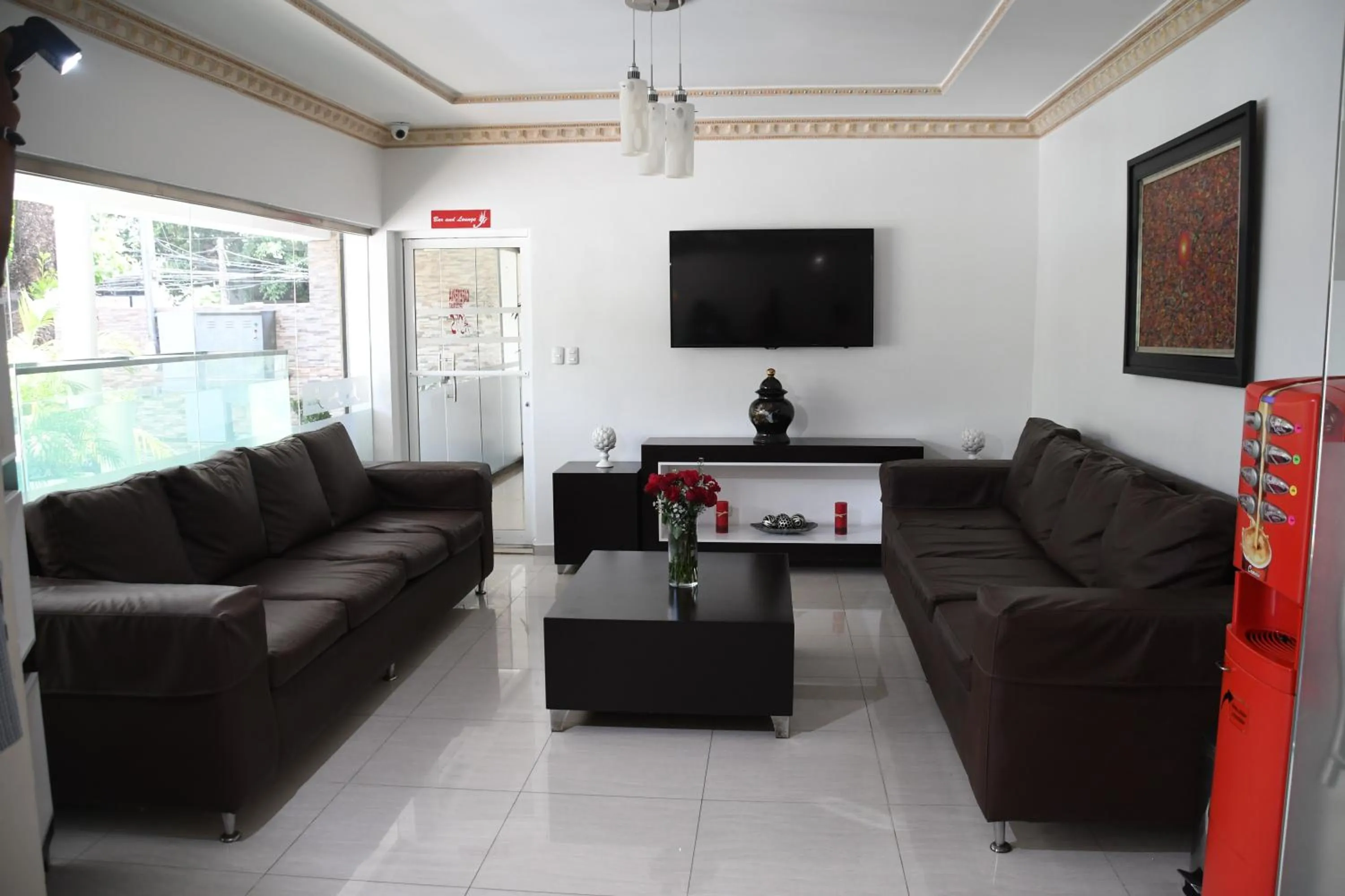 Communal lounge/ TV room in Hostal San Francisco de Asis