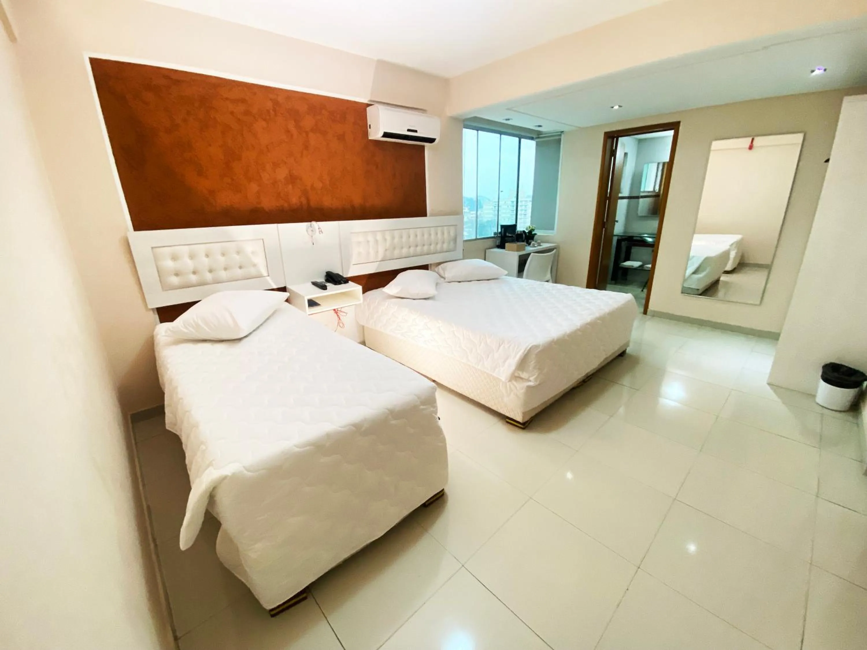 Bed in Emirates Hotel & Suites