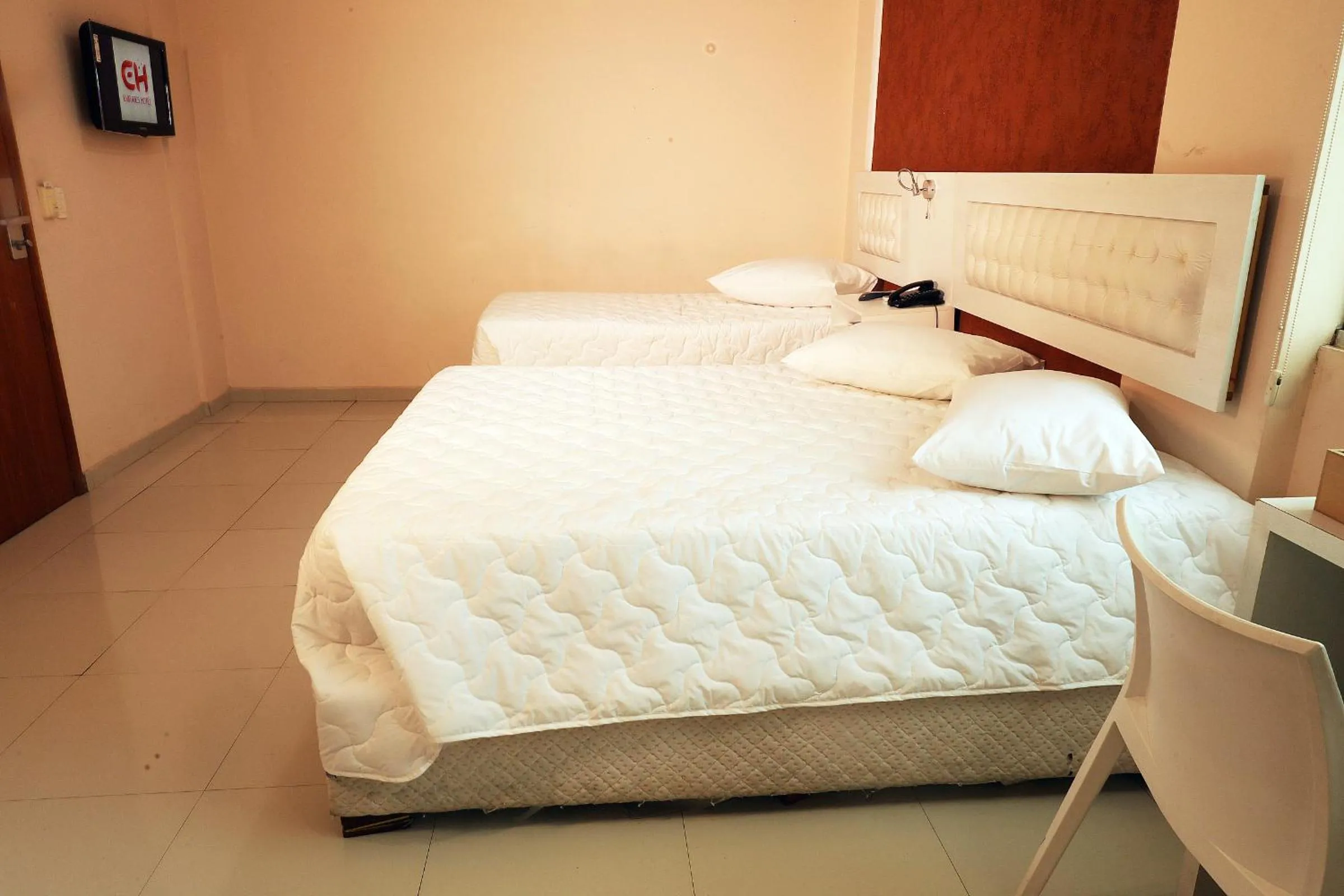 Bed in Emirates Hotel & Suites