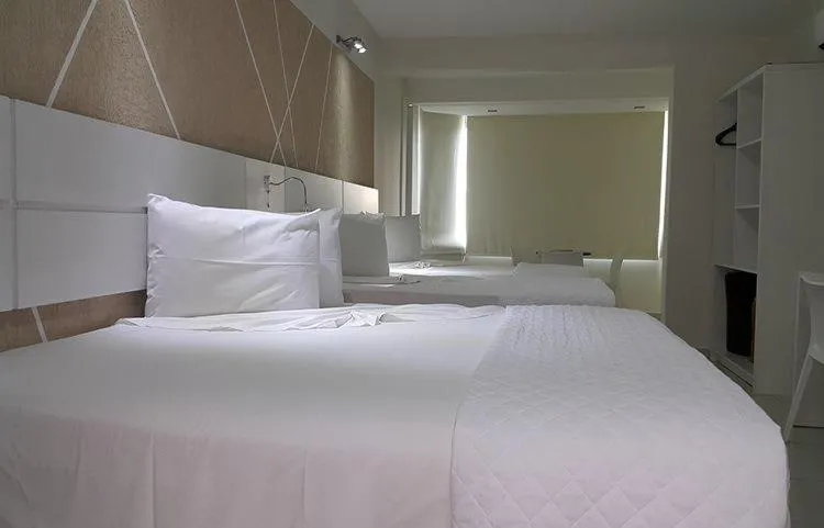 Bed in Emirates Hotel & Suites