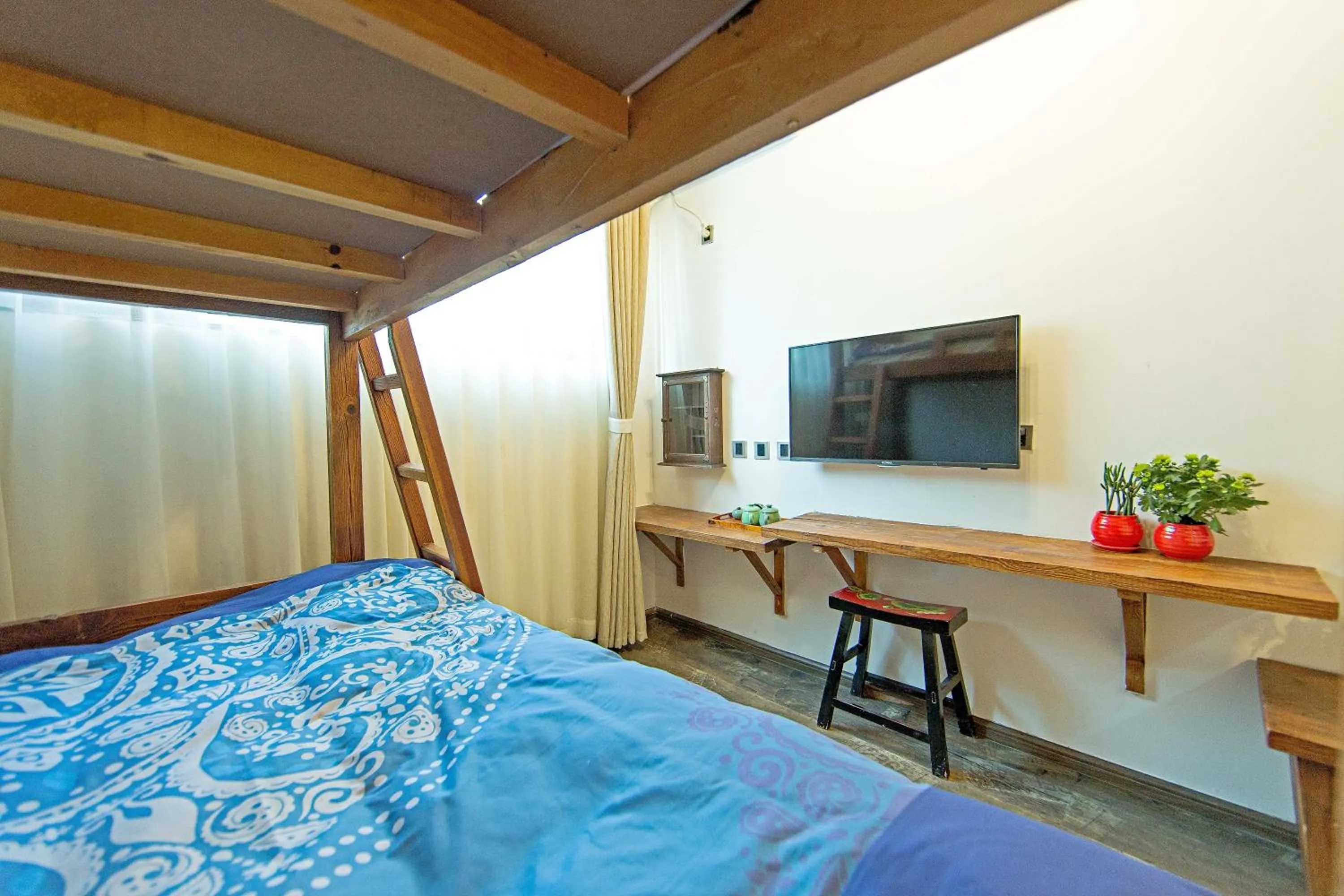 Bed in Old Story Inn Dali Ancient Town