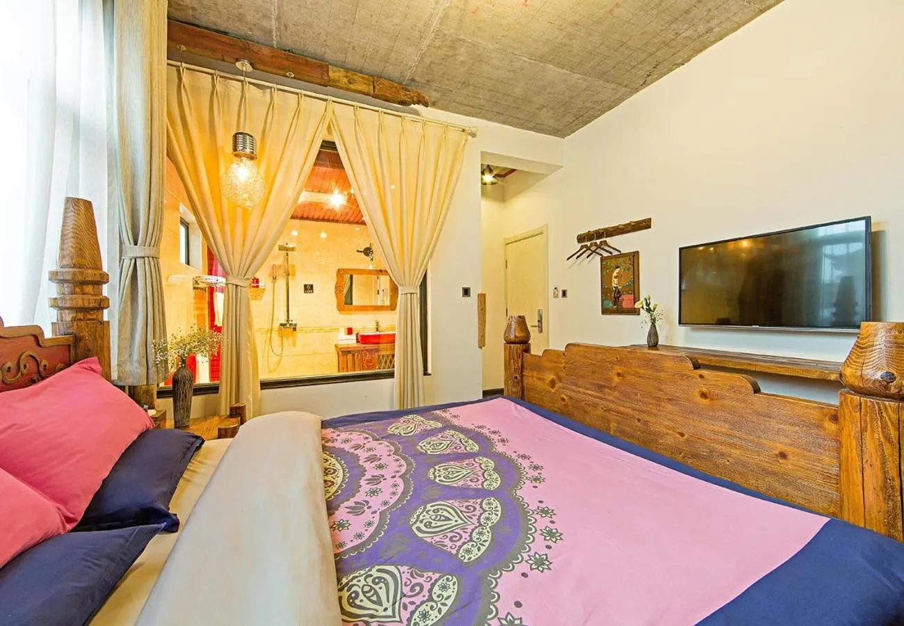 Bed in Old Story Inn Dali Ancient Town