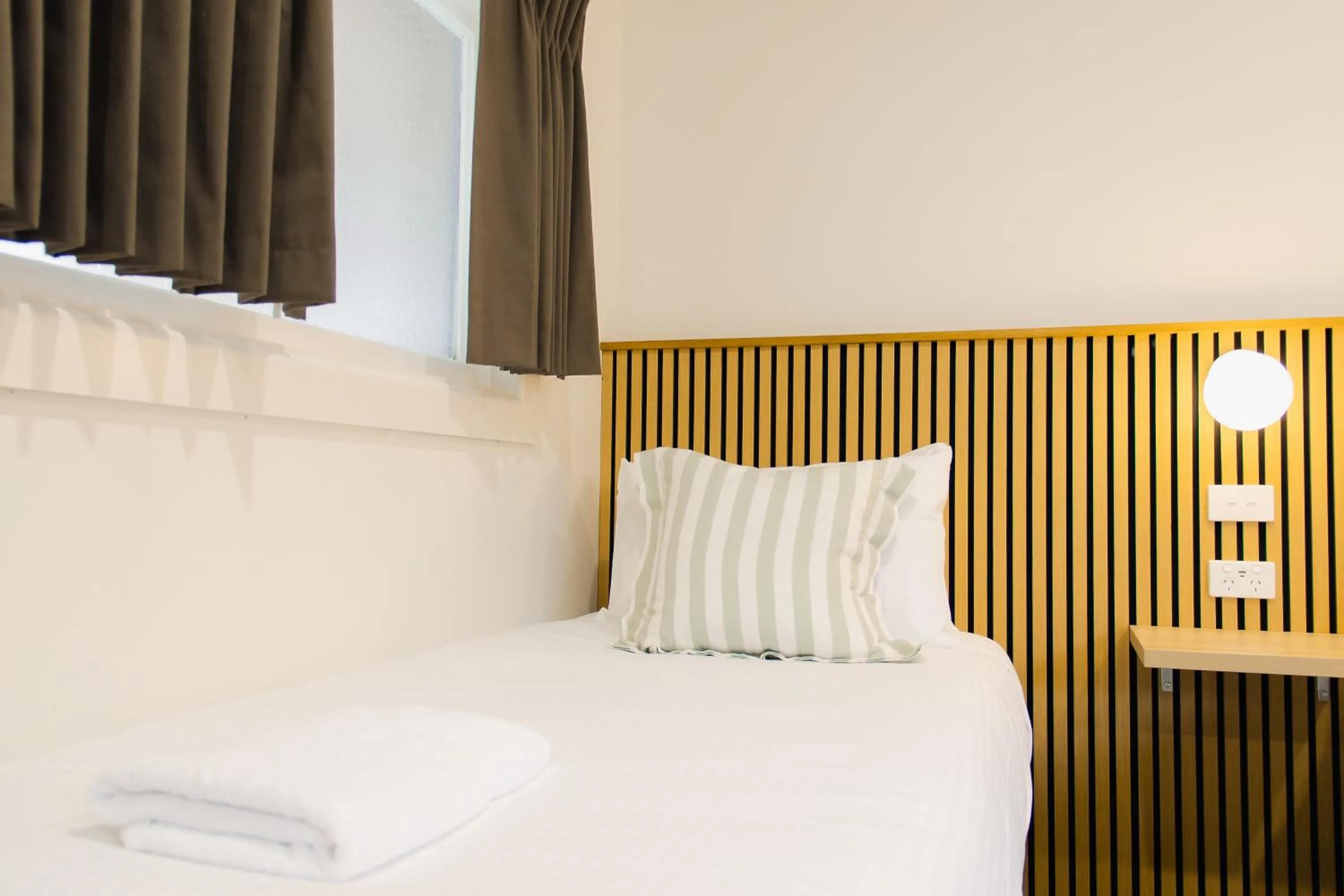 Bed in High Street Motel