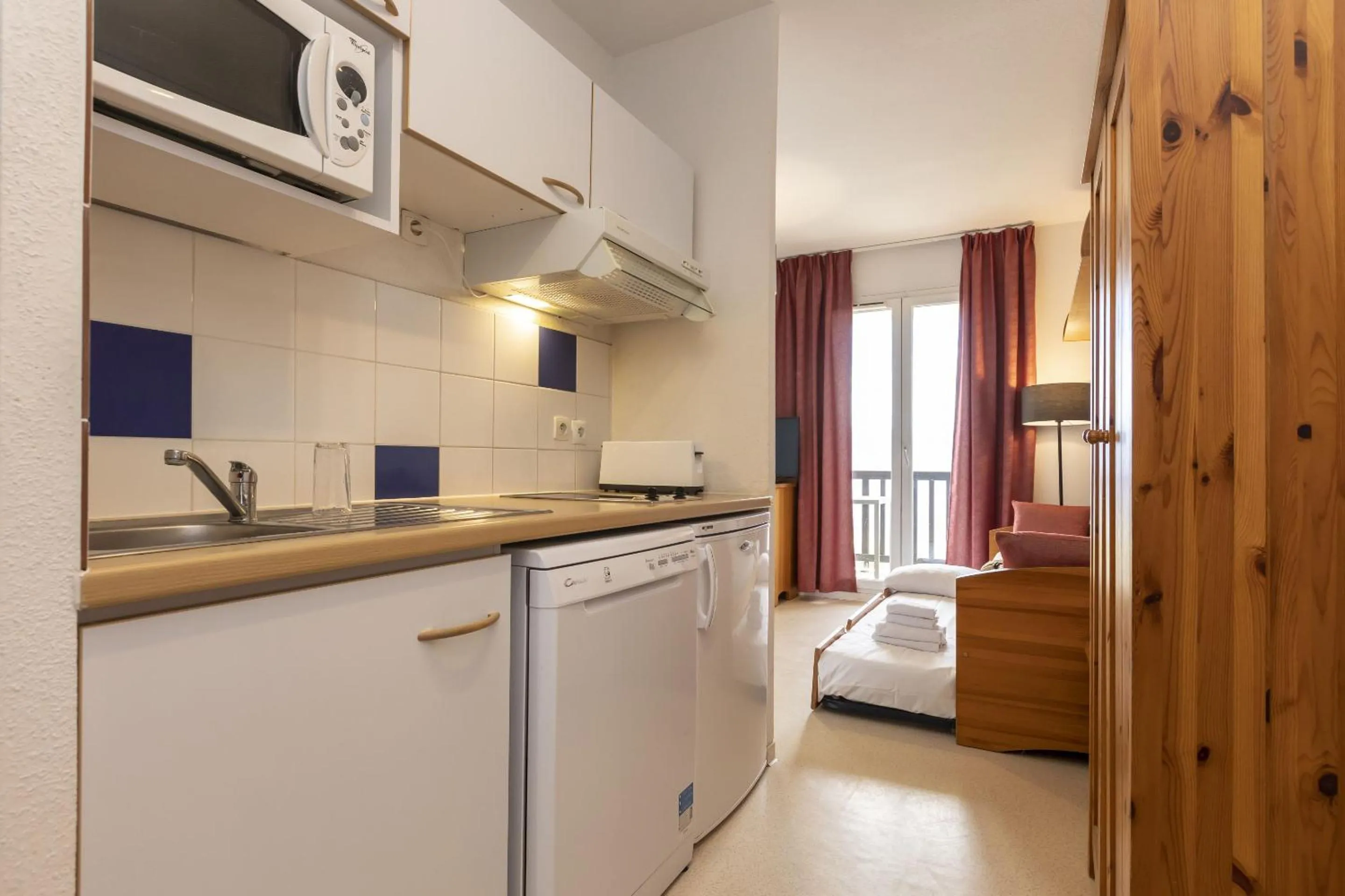 Kitchen or kitchenette in Résidence Odalys Mille Soleils