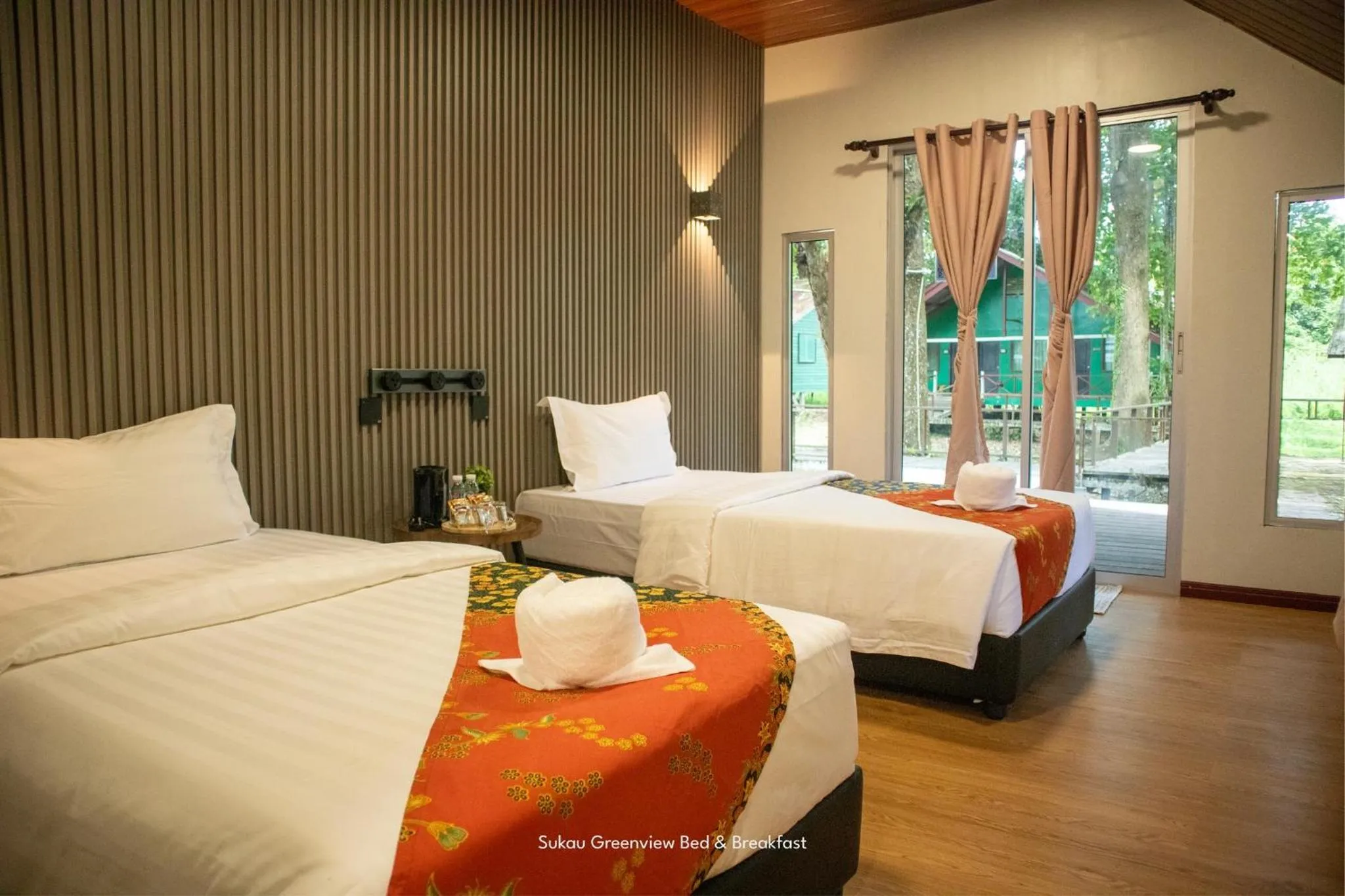 Bed in Sukau Greenview Lodge