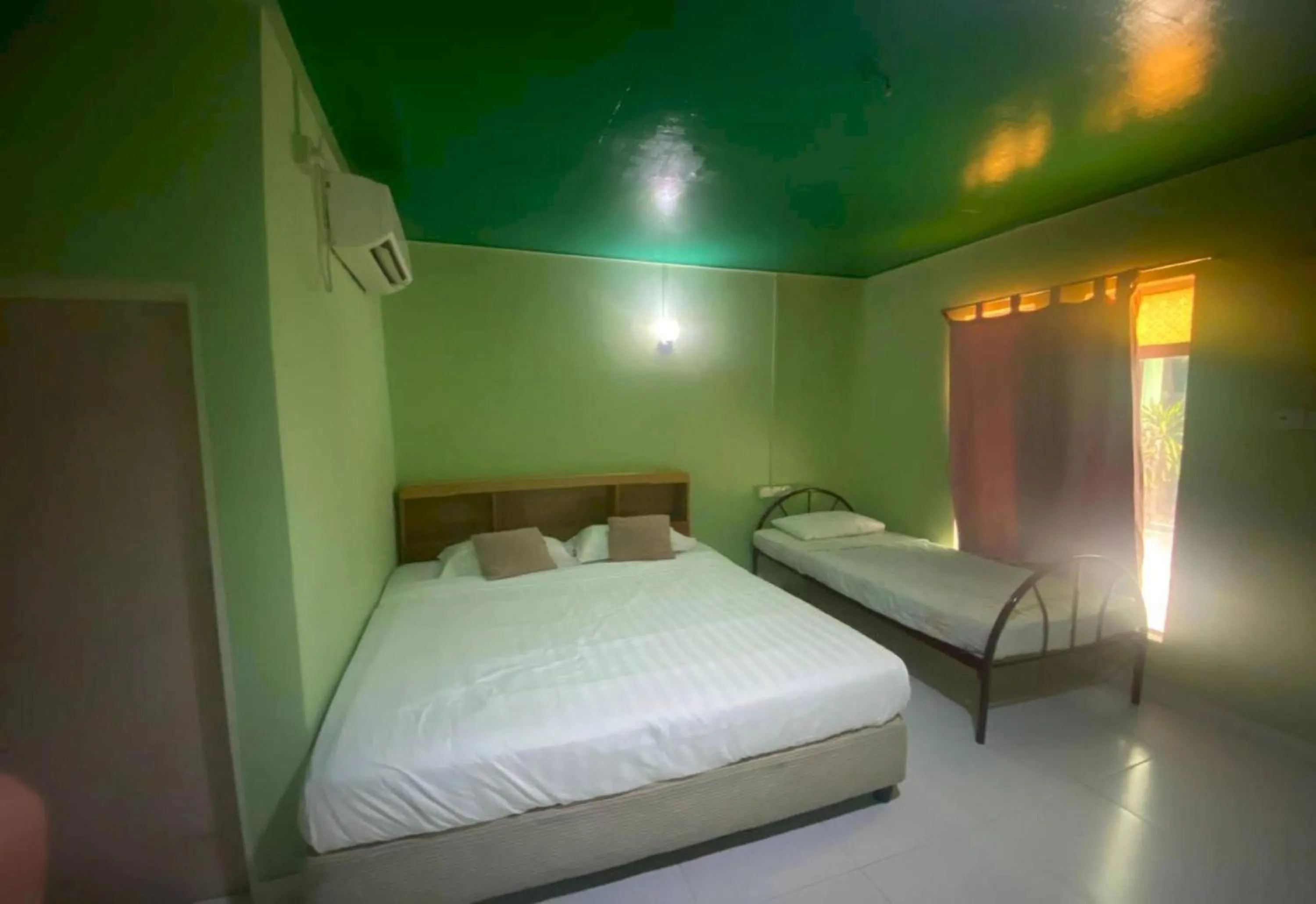 View (from property/room), Bed in Hotel O Villa Thai